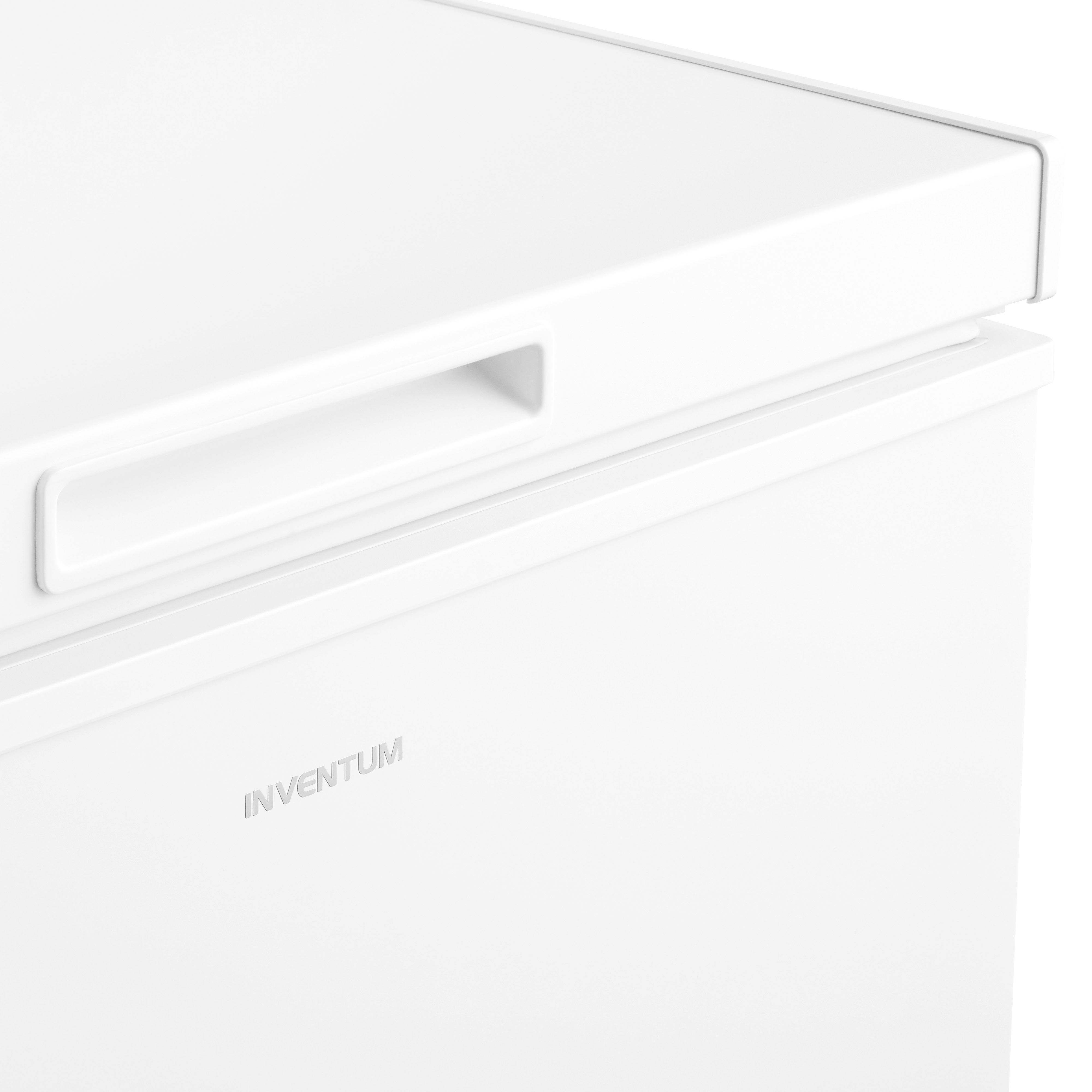 Close-up of a white freezer, with a handle and the brand name 'INVENTUM' visible.
