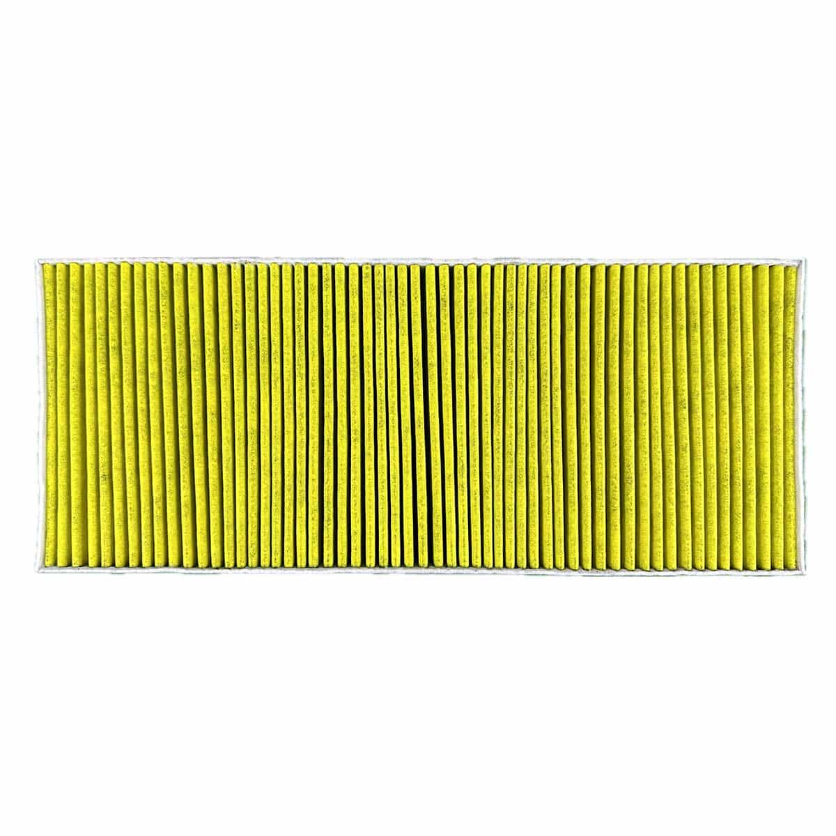 Gelber Filter mit vertikalen Linien, möglicherweise zur Luftreinigung. Rechteckige Form.
