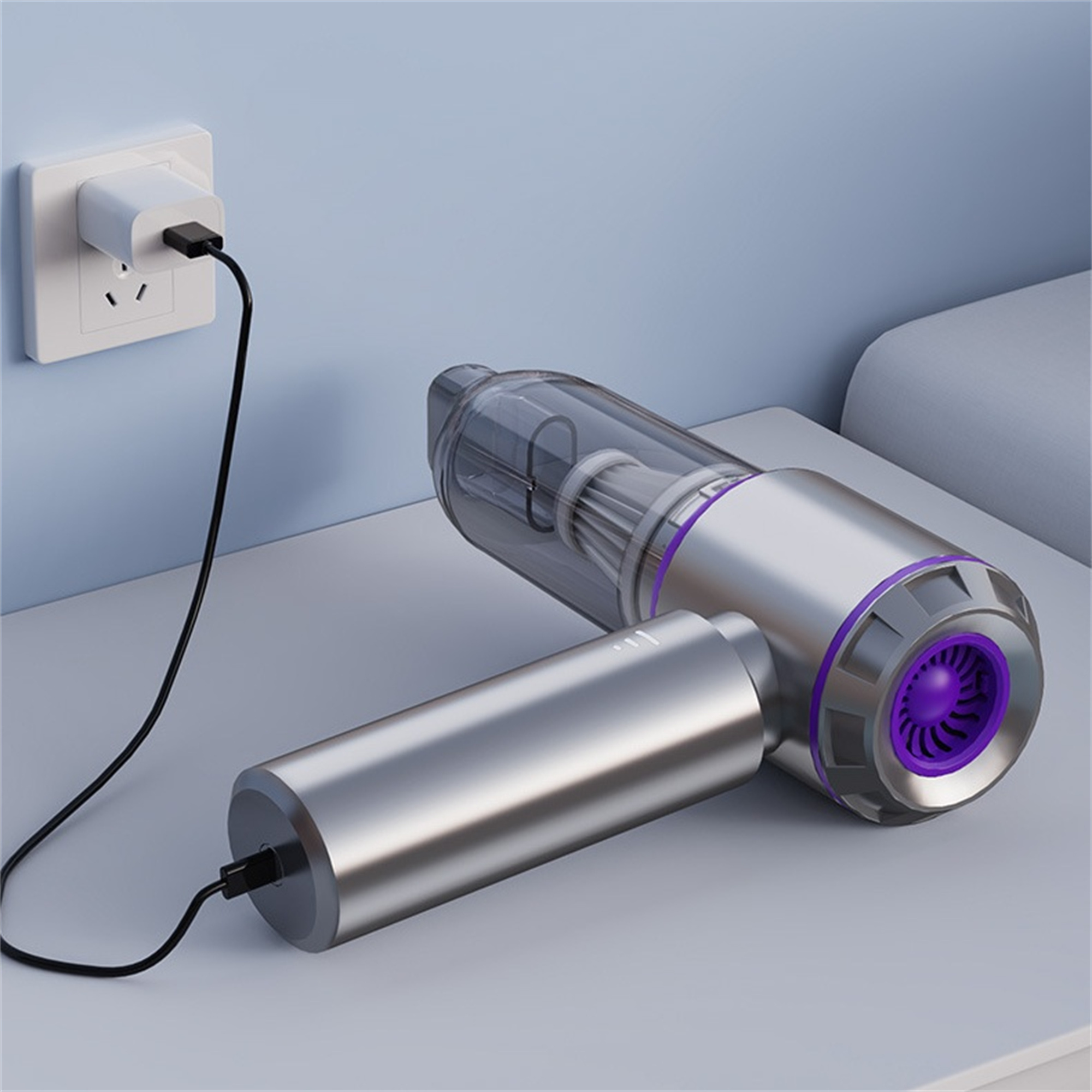 Ein silberner Staubsauger mit Ladestation und Stecker in der Wand. Artikel auf einem Tisch.