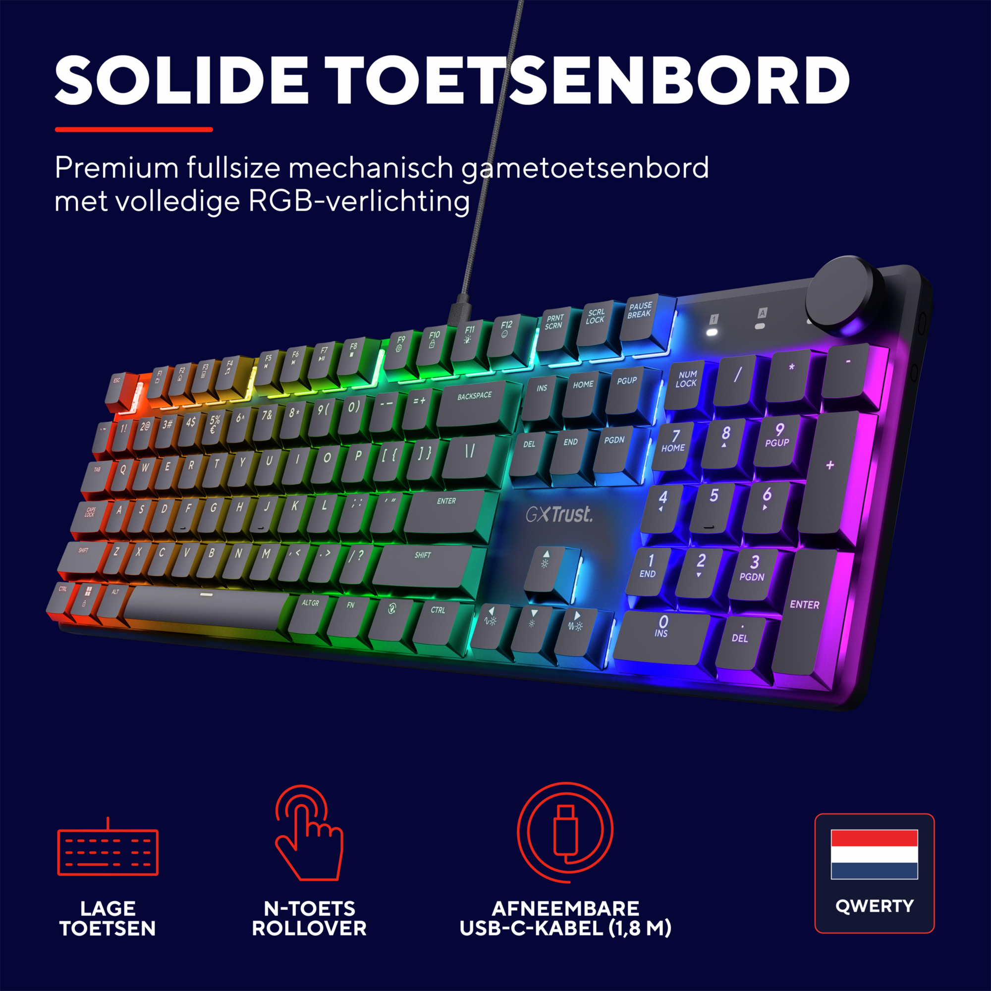 Gaming keyboard with rainbow lights. Black keys, multi-colored lights. Black background.