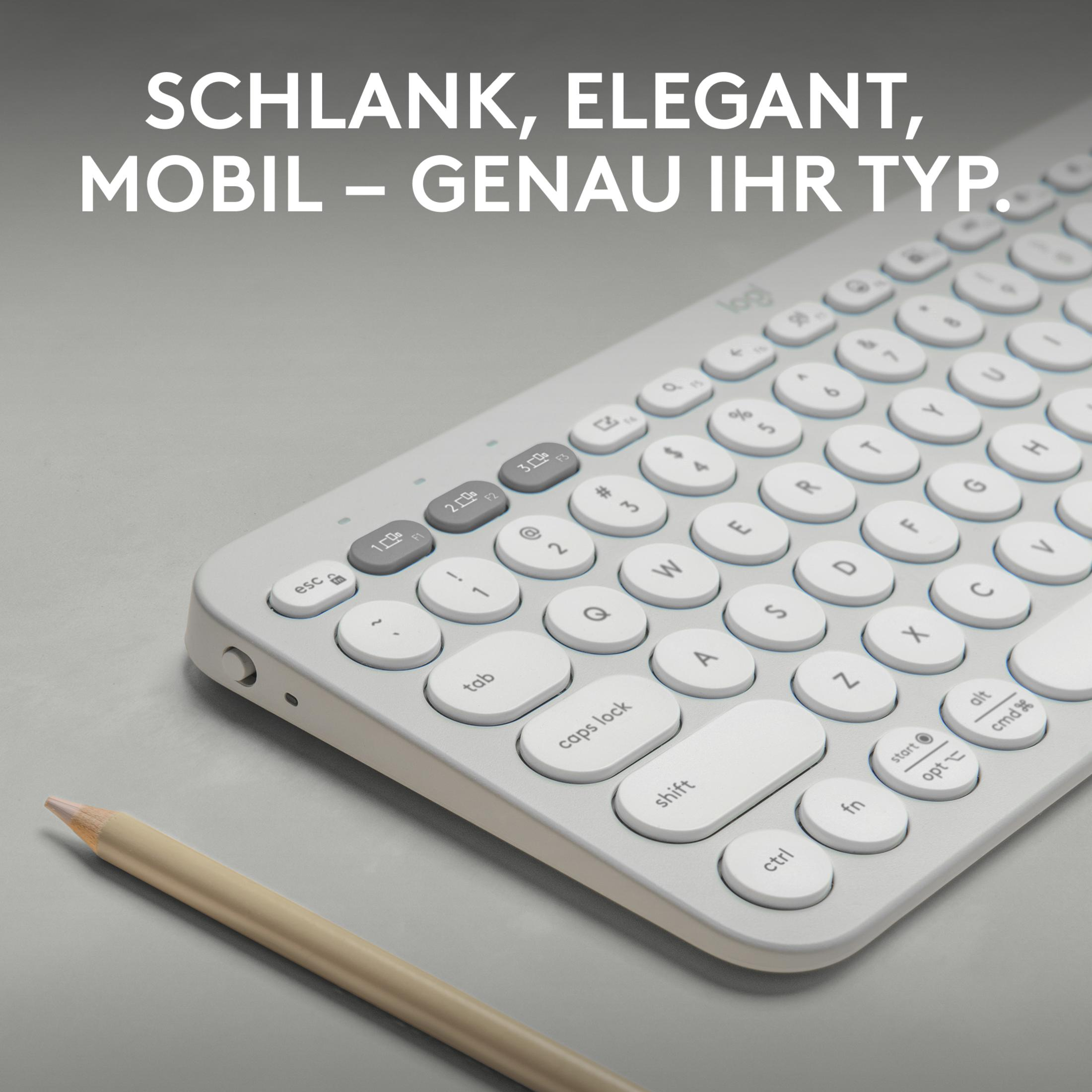 Jasna klawiatura i ołówek. Tekst u góry mówi 'SMUKŁY, ELEGANCKI, MOBILNY - DOKŁADNIE TWÓJ TYP'.