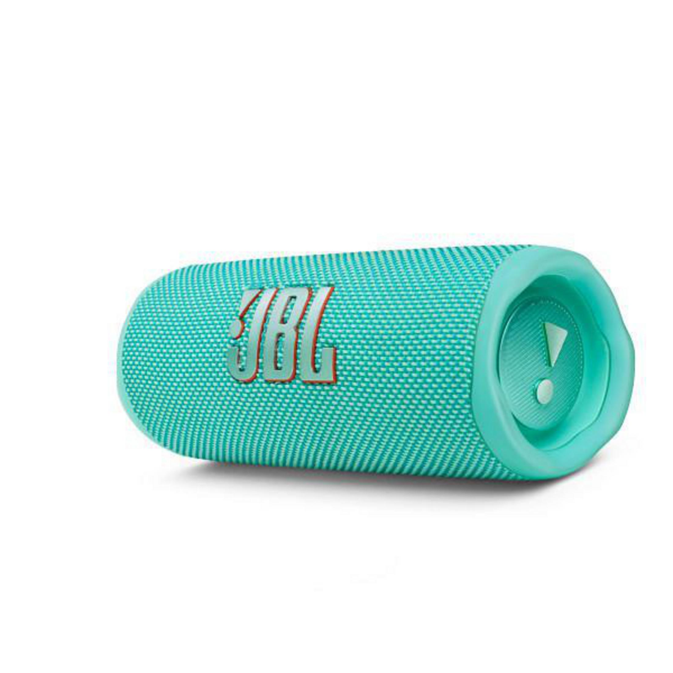 Un altavoz portátil JBL turquesa sobre una superficie blanca.