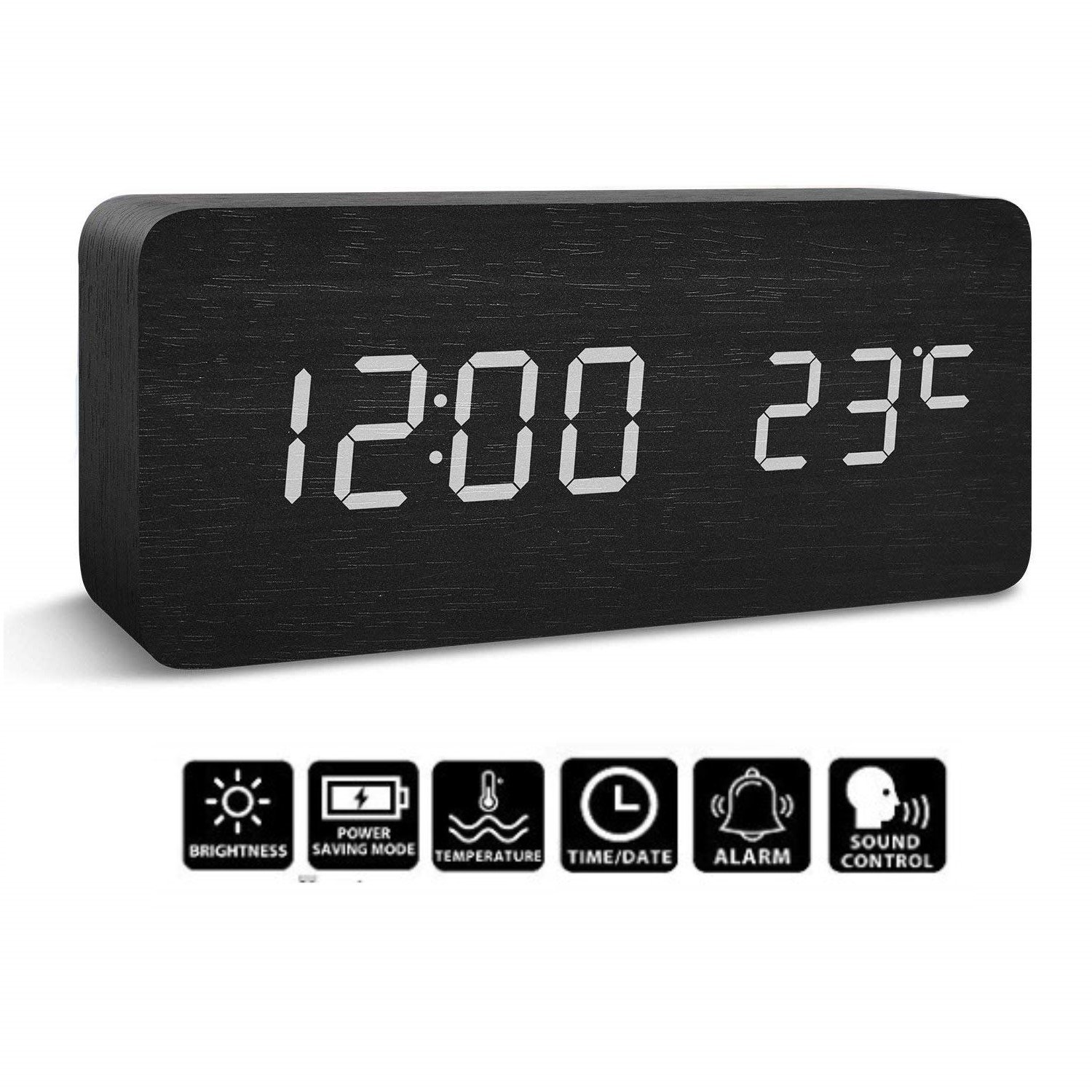 Czarny cyfrowy budzik. Zegar pokazuje godzinę i temperaturę. Zegar na białym tle.