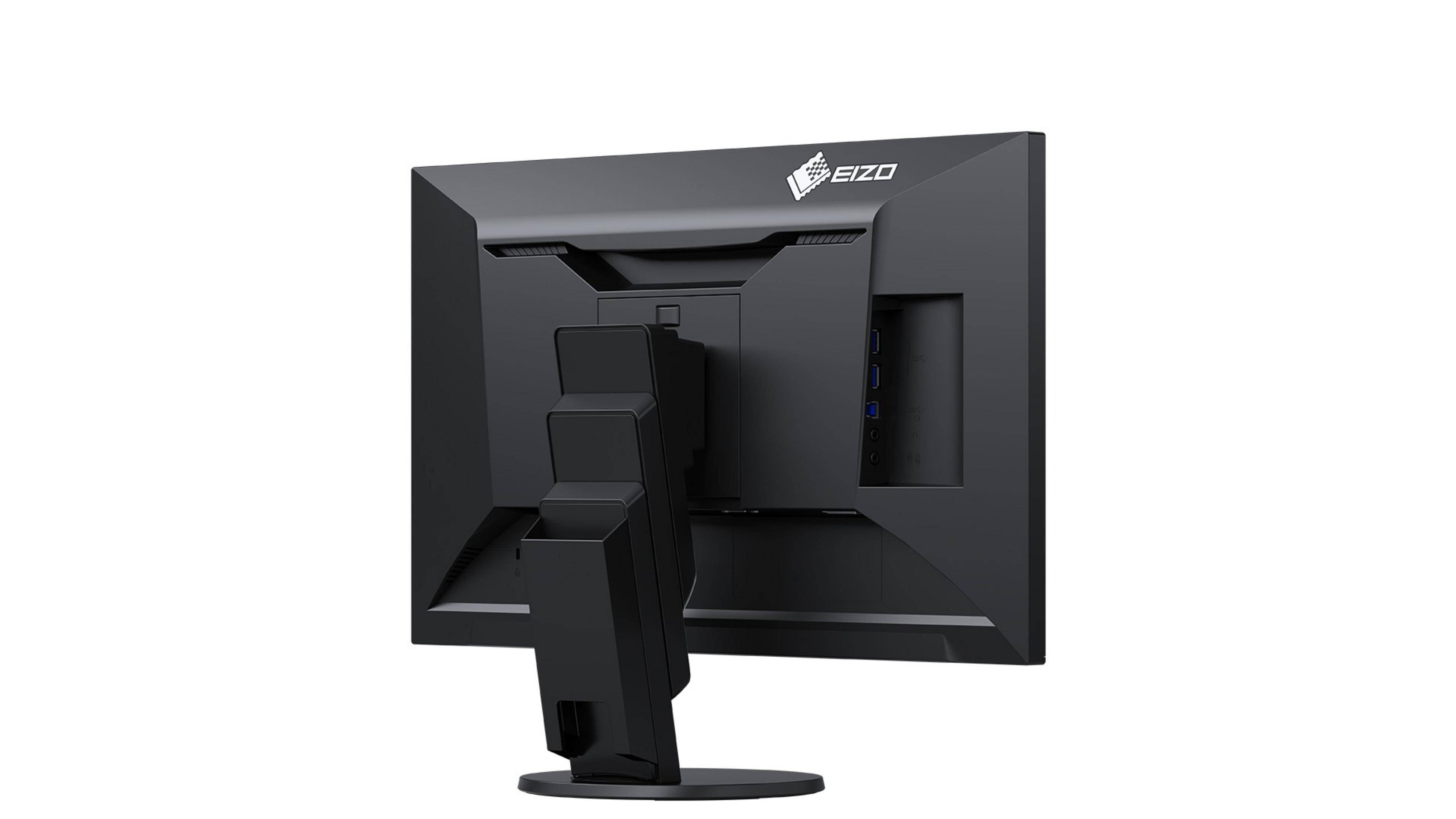 Il retro di un monitor per computer nero. Ha un supporto e diverse porte.