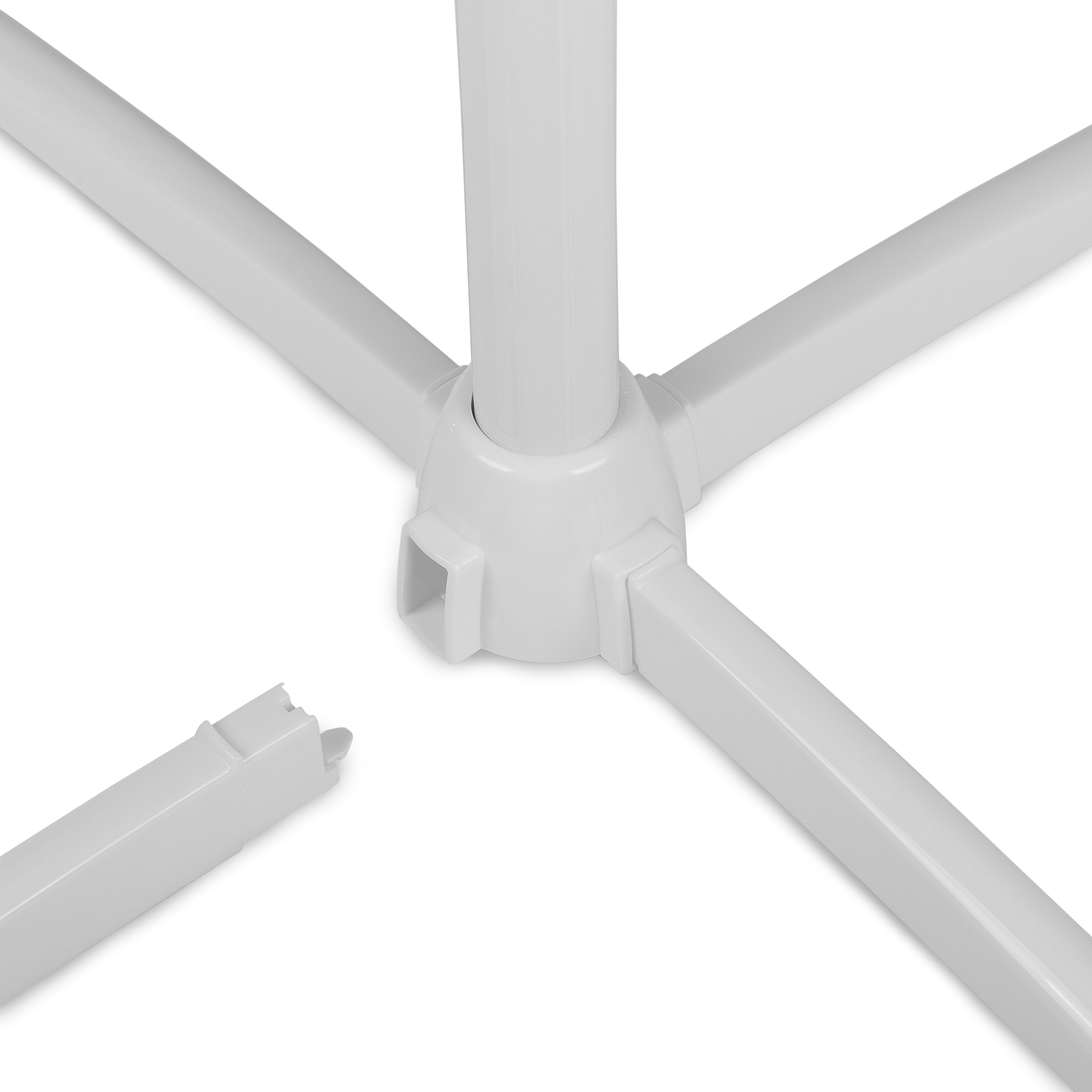 A white tripod base. The legs are connected and one leg is detached.