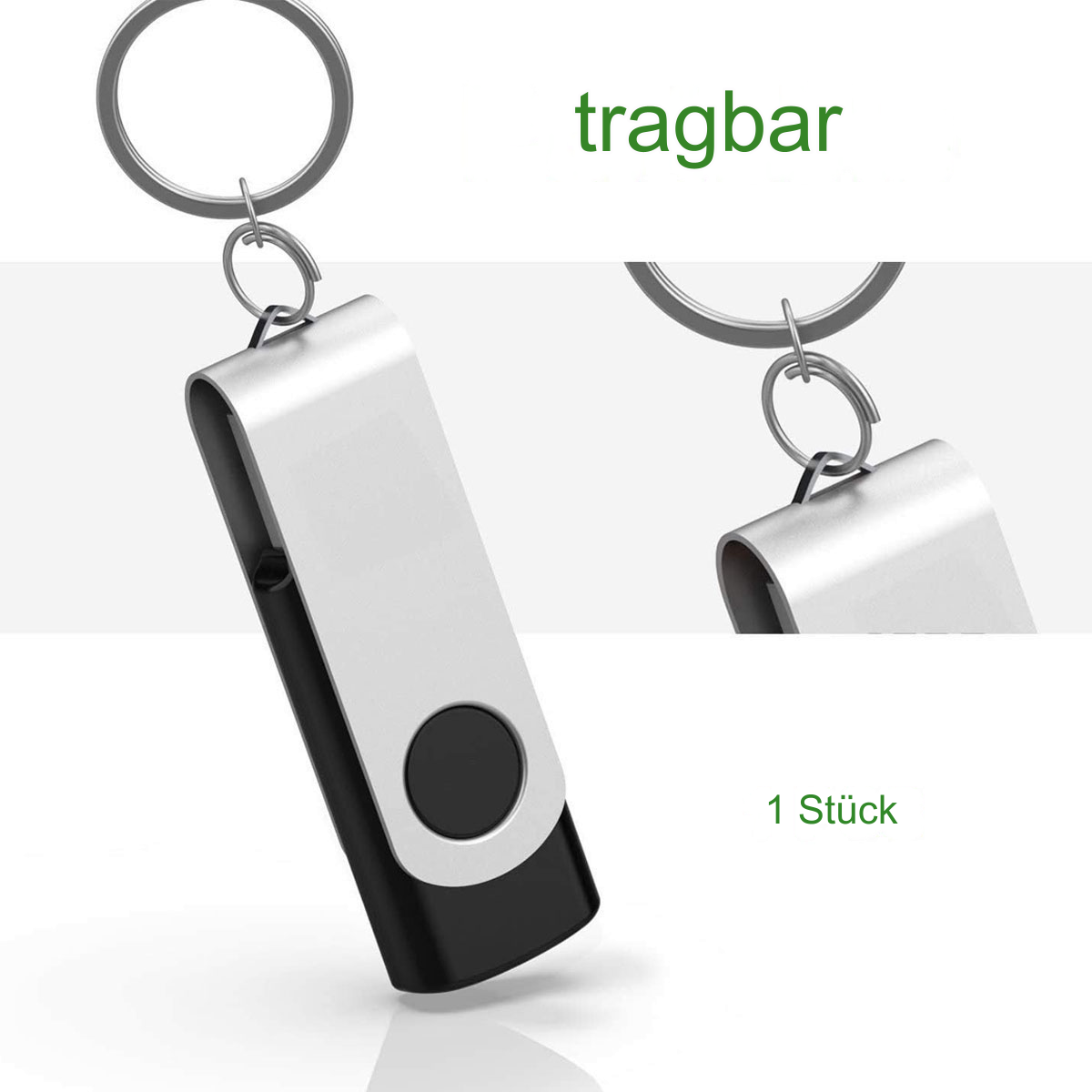 Ein silberner USB-Stick mit schwarzem Ende, an einem Schlüsselring befestigt, und das Wort 'tragbar'.