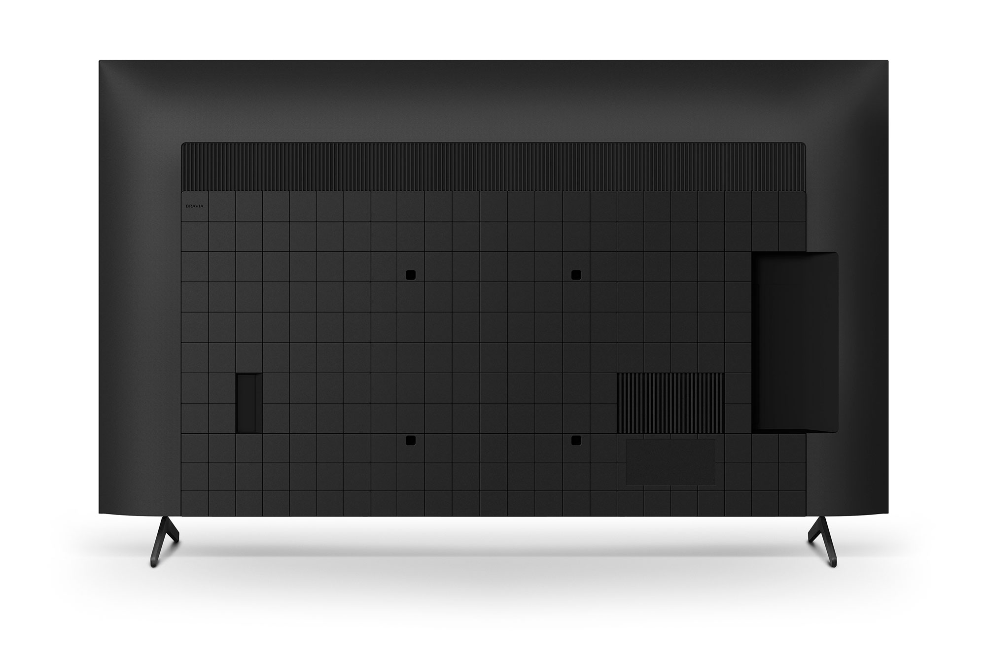 Tył czarnego telewizora Sony. Posiada wzór kratki, porty i punkty montażowe do stojaka.