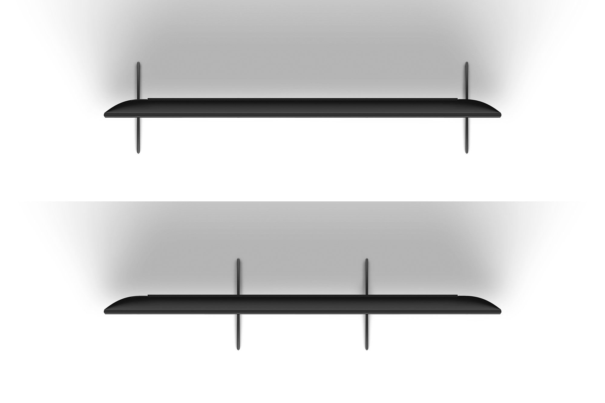 Dwa czarne stojaki pod telewizor na białym tle, widok z góry.