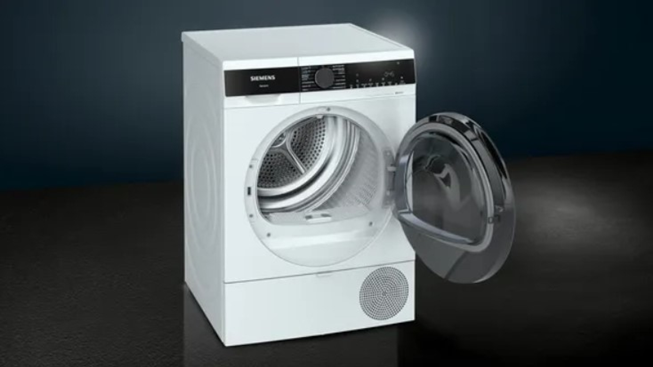 Secadora Siemens blanca con puerta abierta. Fondo azul oscuro. Interior blanco visible.