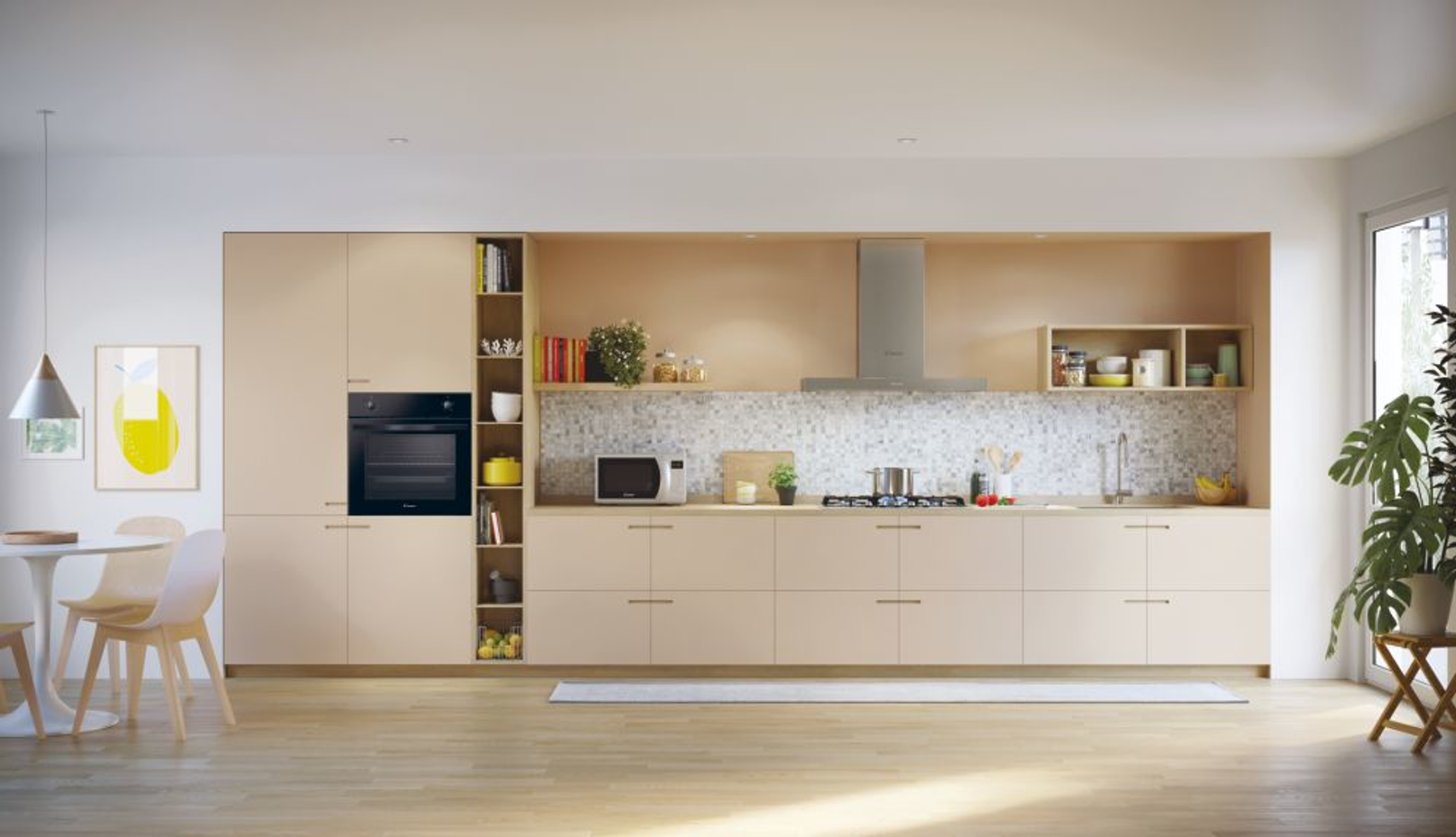 Nowoczesna kuchnia z jasnymi drewnianymi szafkami, piekarnikiem, kuchenką mikrofalową i roślinami.