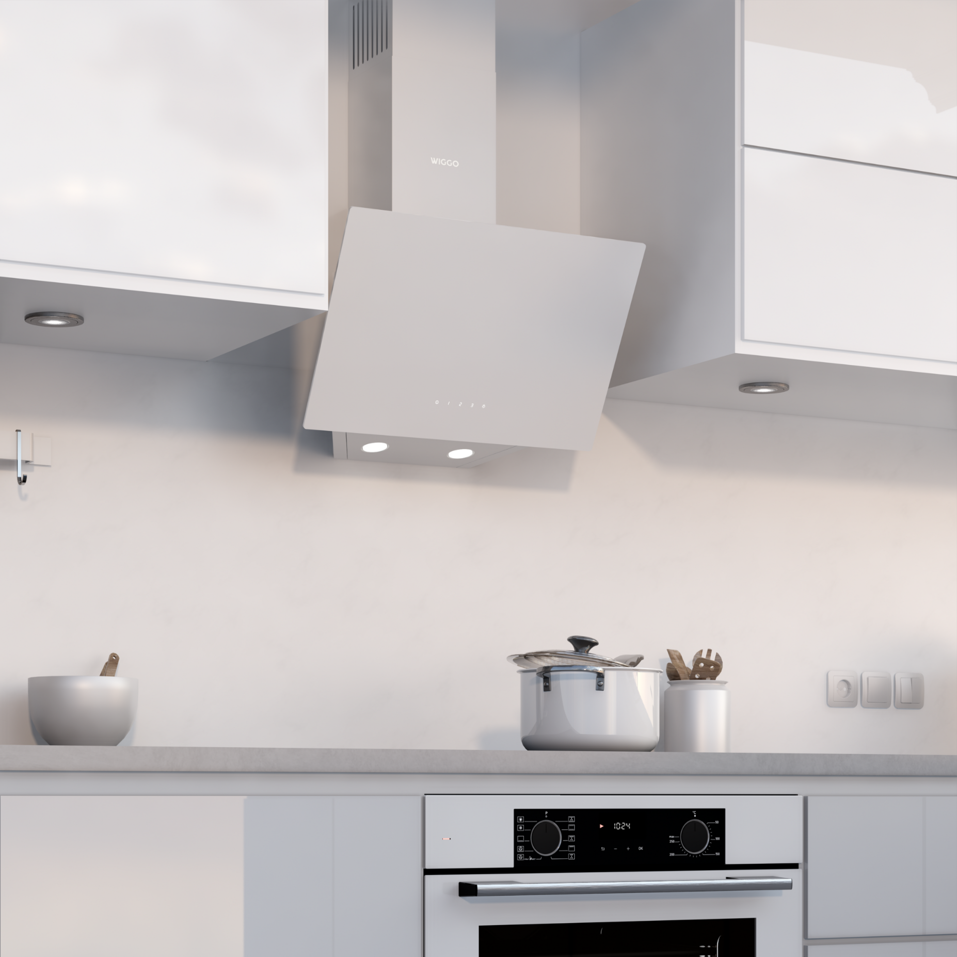 Une cuisine blanche moderne avec une hotte aspirante au-dessus d'une table de cuisson. Des placards blancs et un évier sont également visibles.