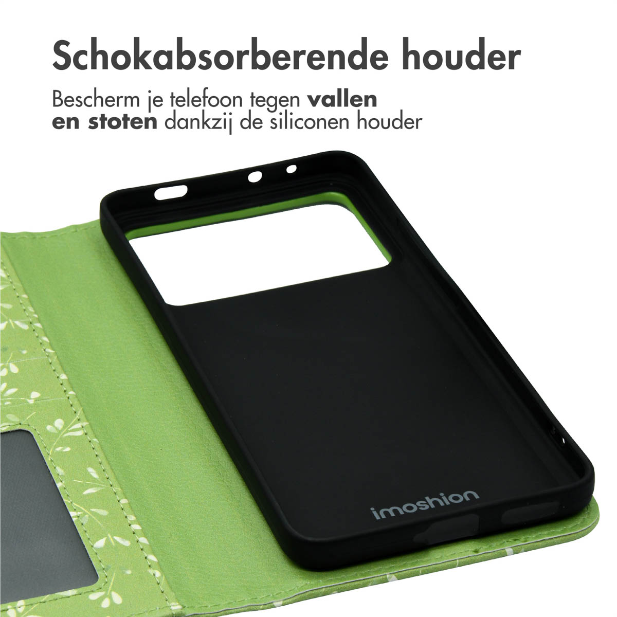 Groene telefoonhoes met zwart interieur, open op een oppervlak.
