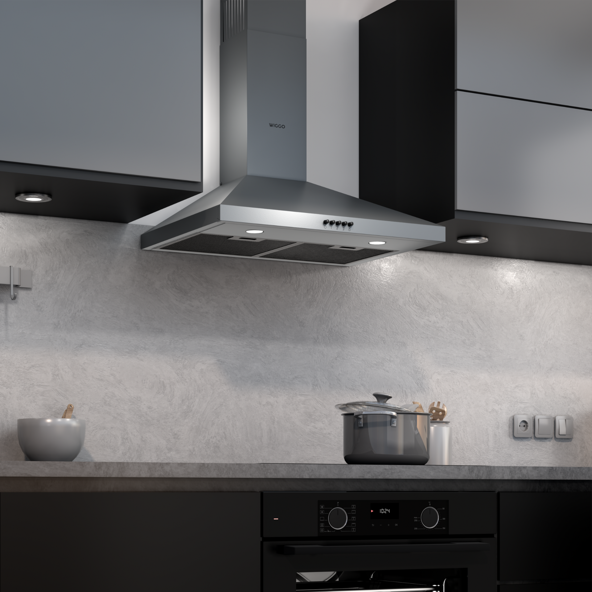 Scène de cuisine moderne, hotte en acier inoxydable, armoires noires et comptoir gris avec four.