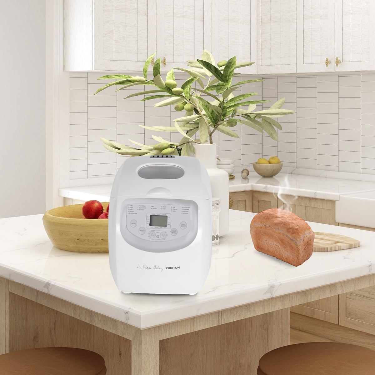 Biała maszyna do pieczenia chleba na blacie kuchennym. Bochenek chleba po prawej.