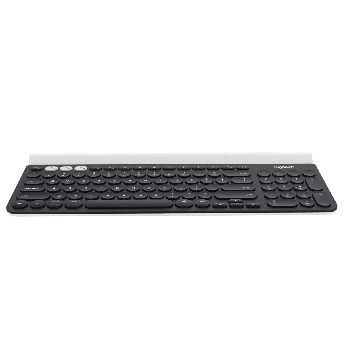 Teclado Logitech negro y plateado con teclas blancas, visto desde arriba, sobre una superficie blanca.