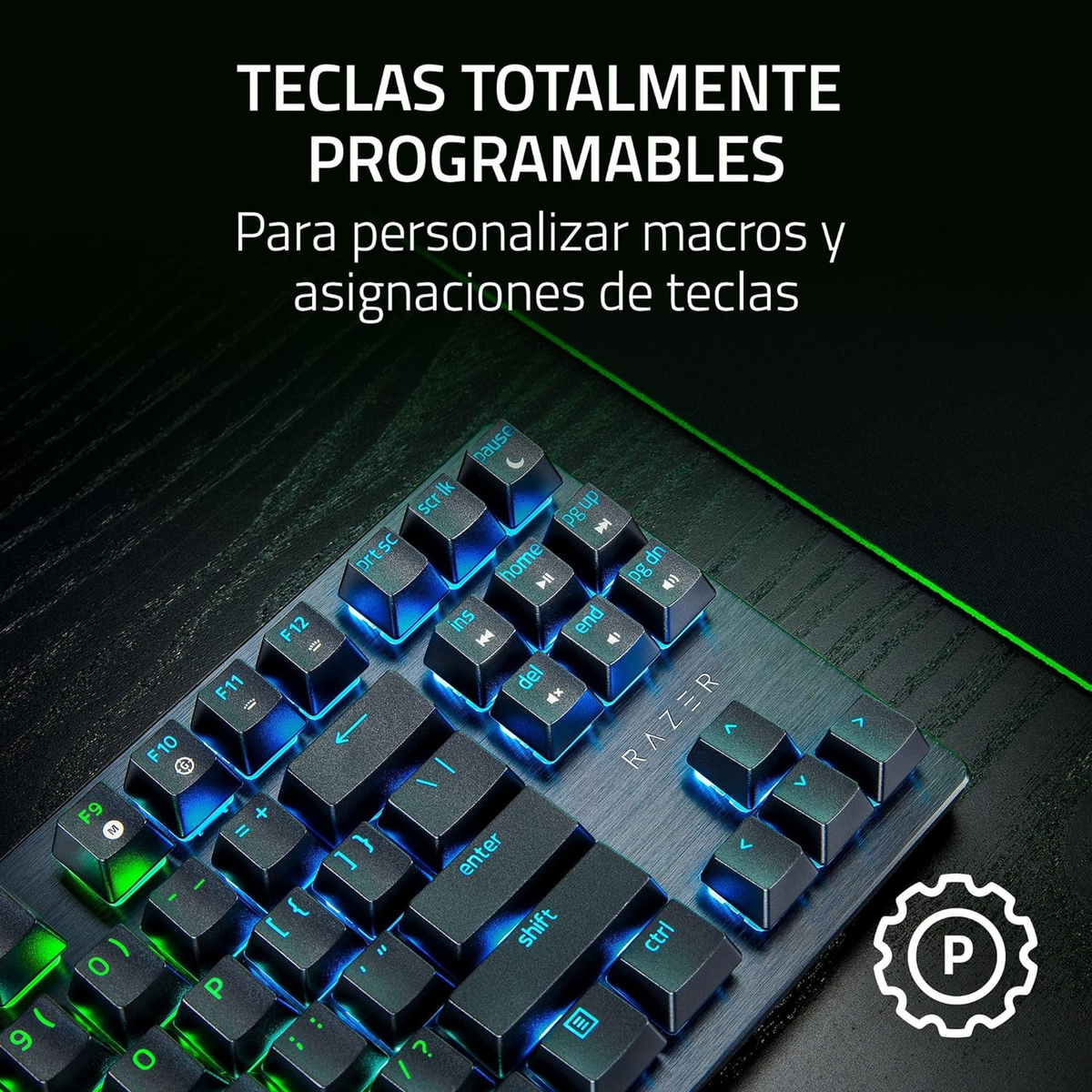 Tastiera nera con tasti illuminati. Testo sovrapposto: tasti completamente programmabili. Illuminazione verde e blu, superficie nera.