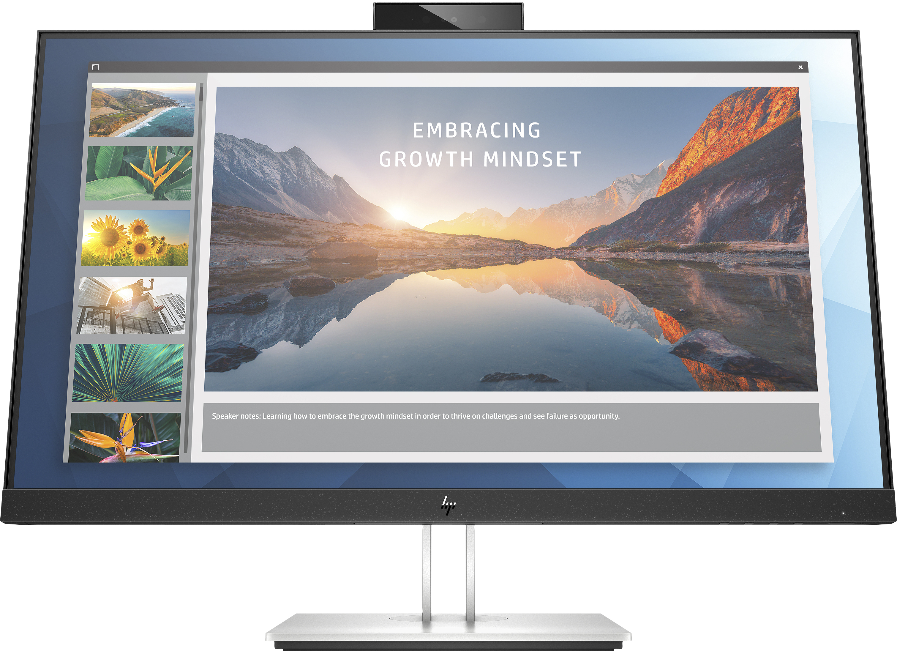 Monitor HP che mostra una presentazione sulla mentalità di crescita. Ha una webcam e un supporto argentato.
