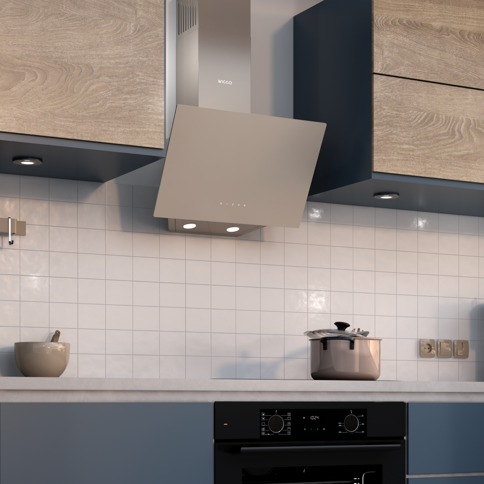 Une cuisine moderne avec une hotte, des placards et un four noir. Carrelage blanc.