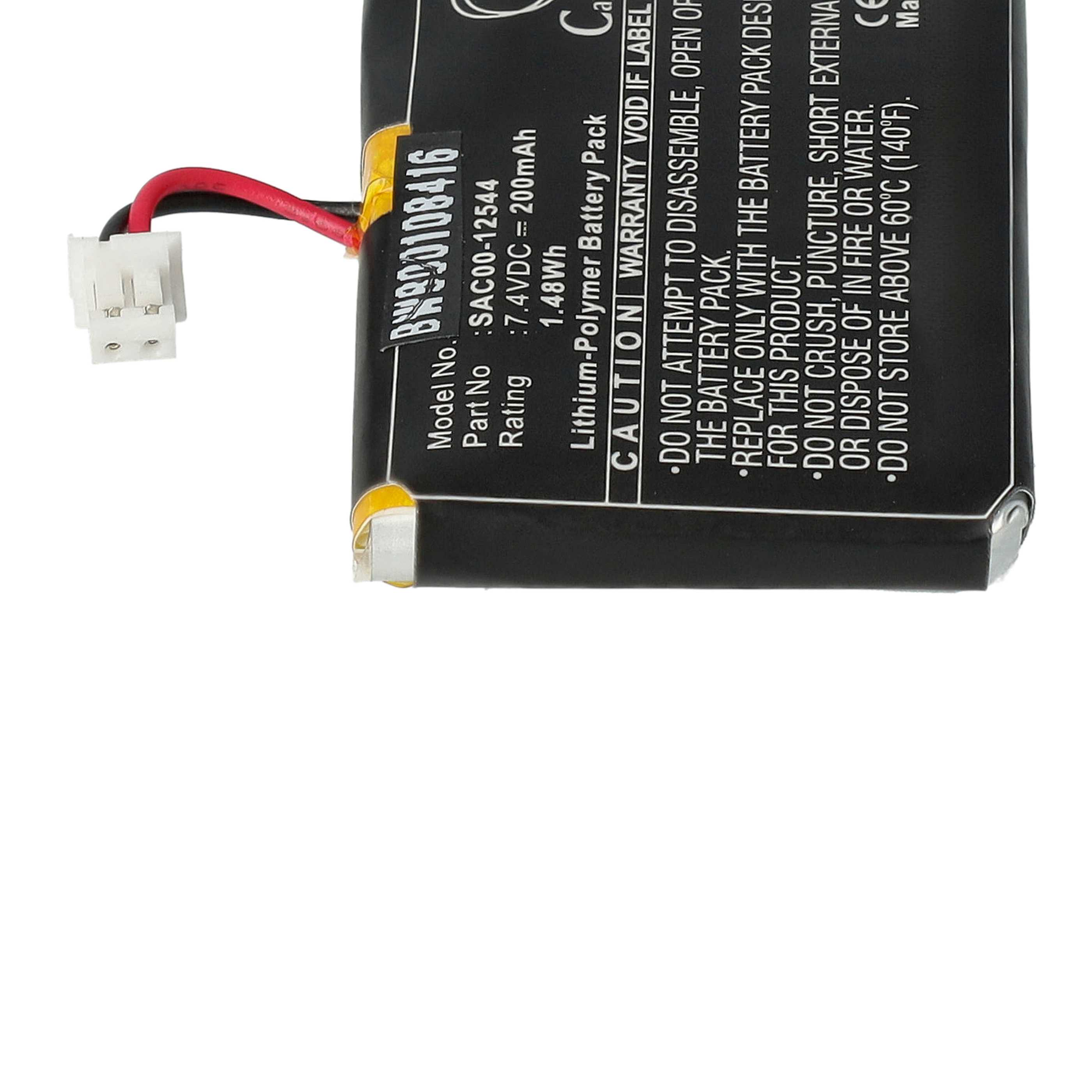 Nahaufnahme eines schwarzen und gelben Batterieetiketts. Text enthält Modell, Teilenummer und Warnungen.