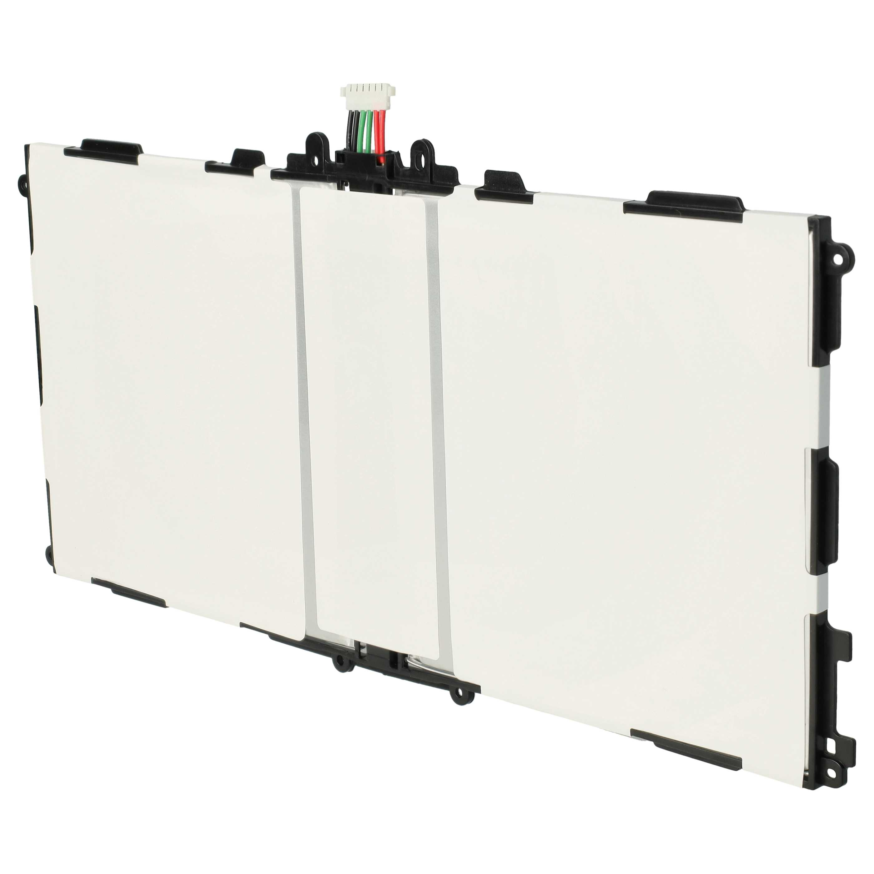 Drei weiße Batteriezellen mit schwarzen Haltern und einem Stecker mit farbigen Drähten.