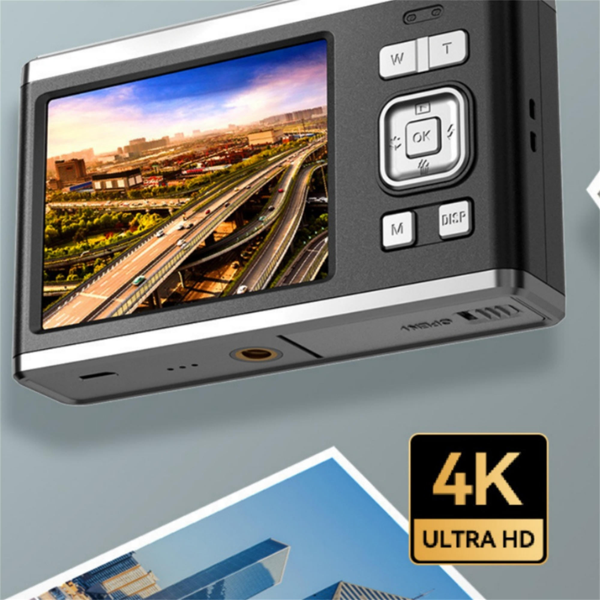 Eine Kamera mit Display, das eine Stadtlandschaft zeigt, zusammen mit einem 4K Ultra HD-Logo.