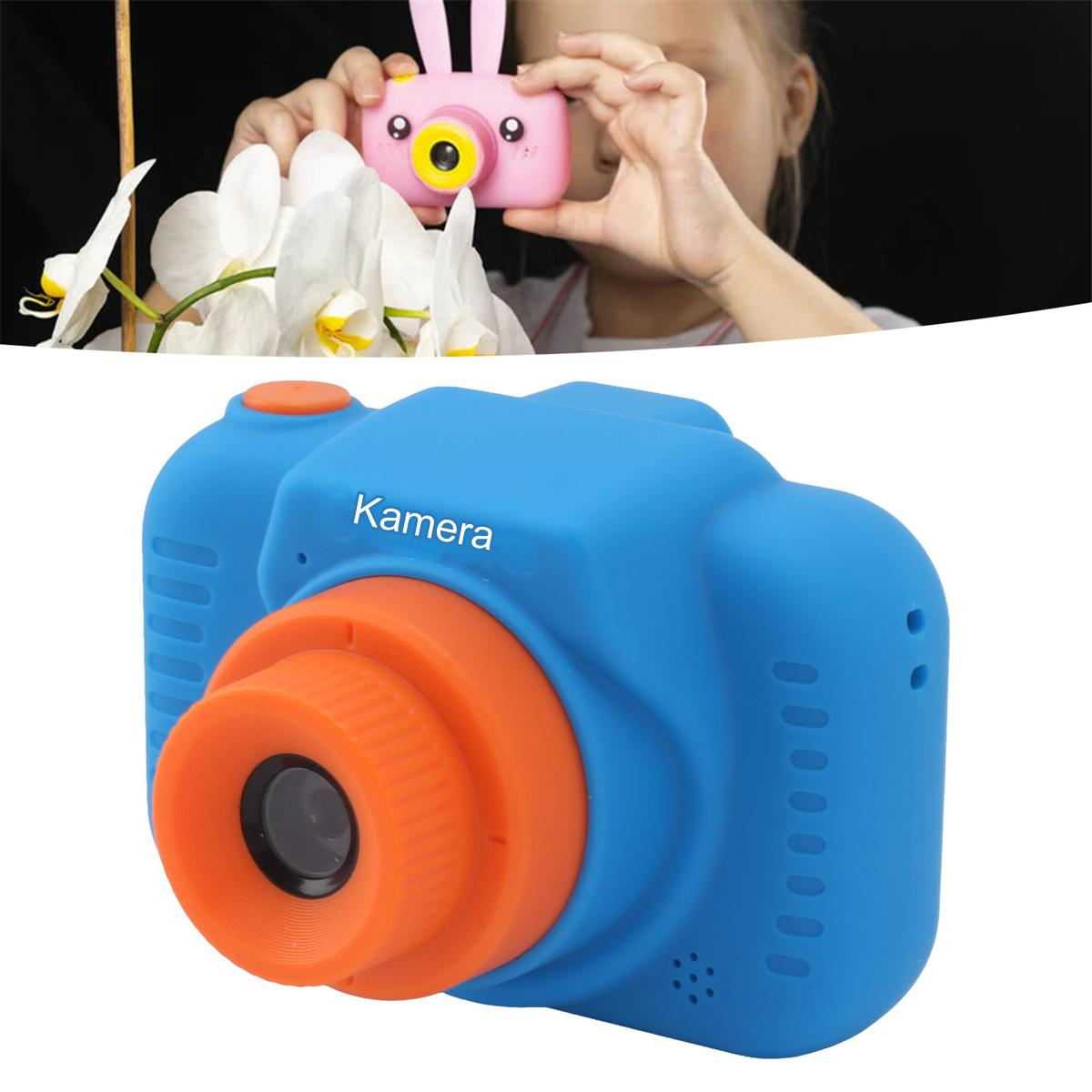 Eine blaue und orangefarbene Kinderkamera, mit einer rosa Kamera, die von einem Mädchen gehalten wird.