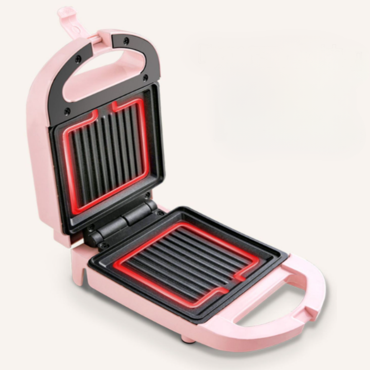 Rosa Sandwichmaker, offen. Gitter im Inneren sind sichtbar. Griff oben.