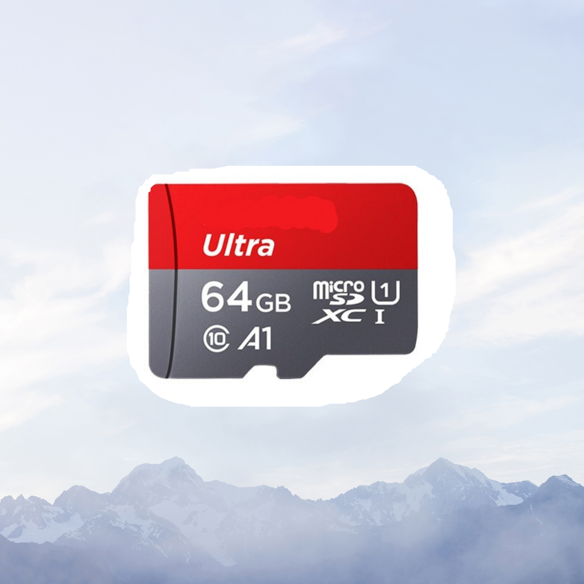 Eine Micro-SD-Karte mit rotem und grauem Oberteil, der Hintergrund ist ein Gebirge.