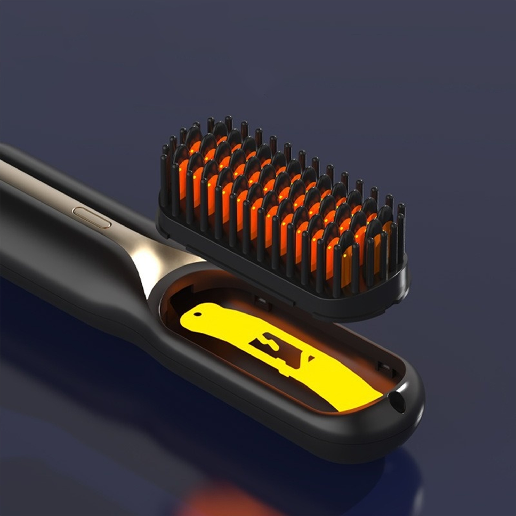 Haarglättungsbürste mit orangenen Heizelementen. Schwarz und Gold.
