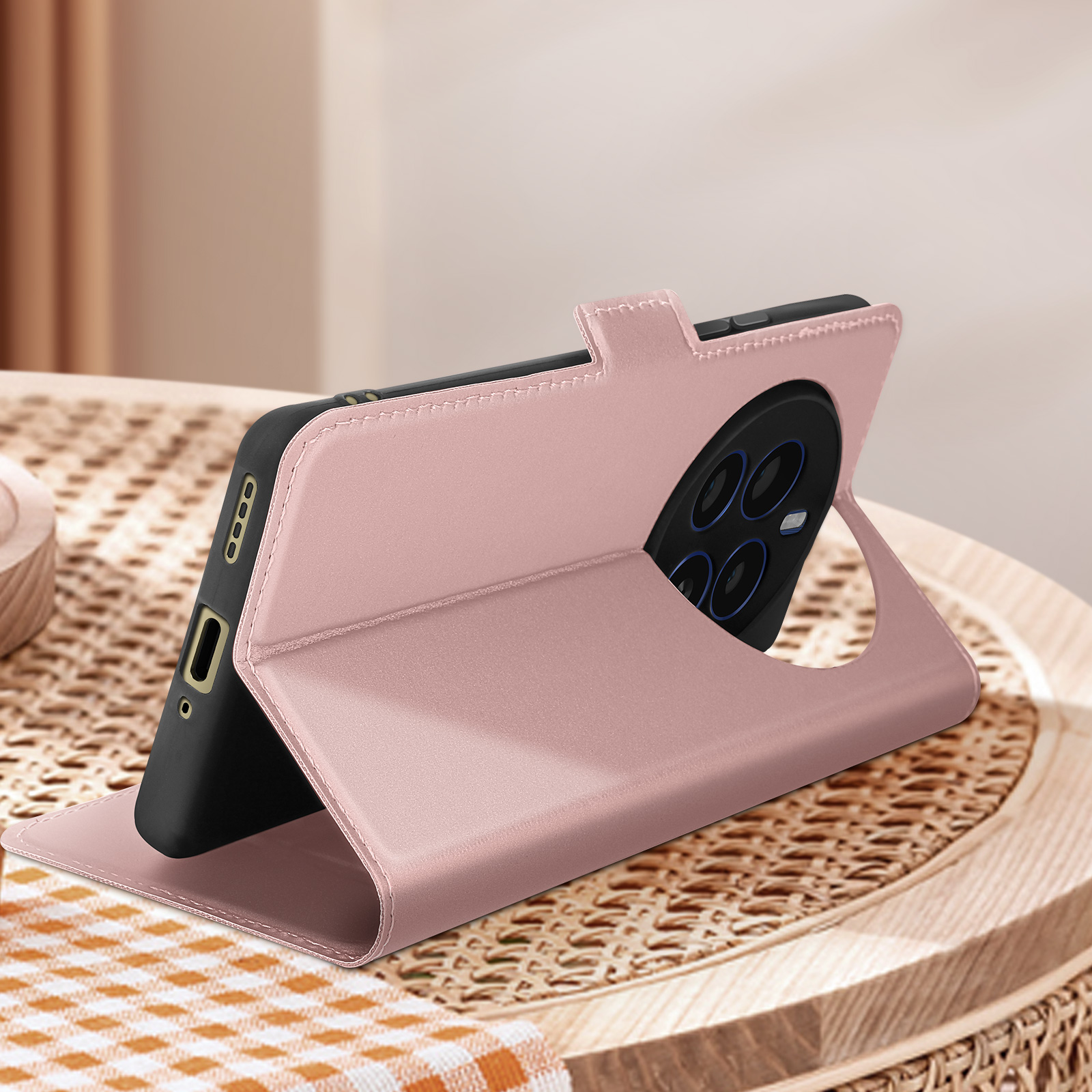 Custodia rosa per telefono, aperta, che tiene un telefono. Il telefono ha più lenti.