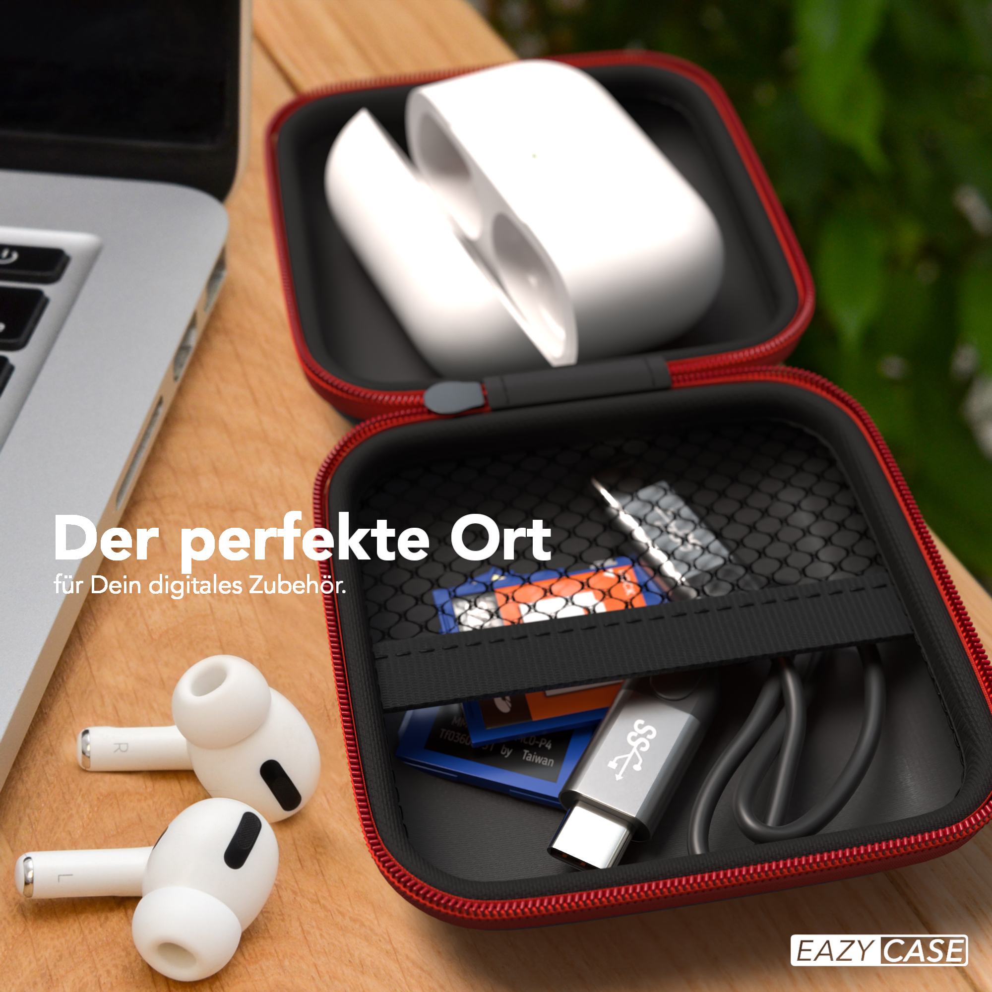 Ein rotes Etui mit einem Paar Ohrhörern und Zubehör.