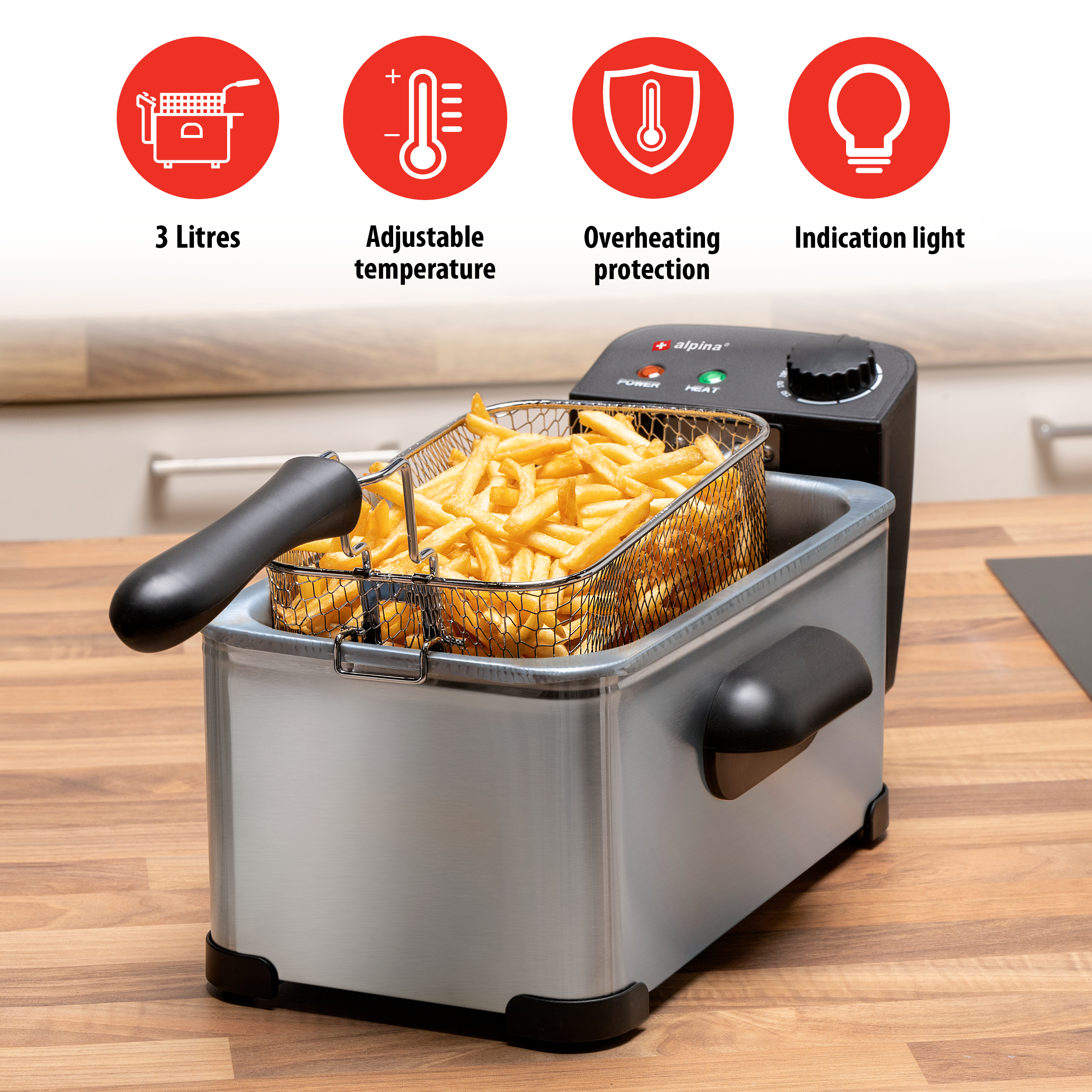 Zilveren friteuse met frietjes erin, pictogrammen en tekst erboven.