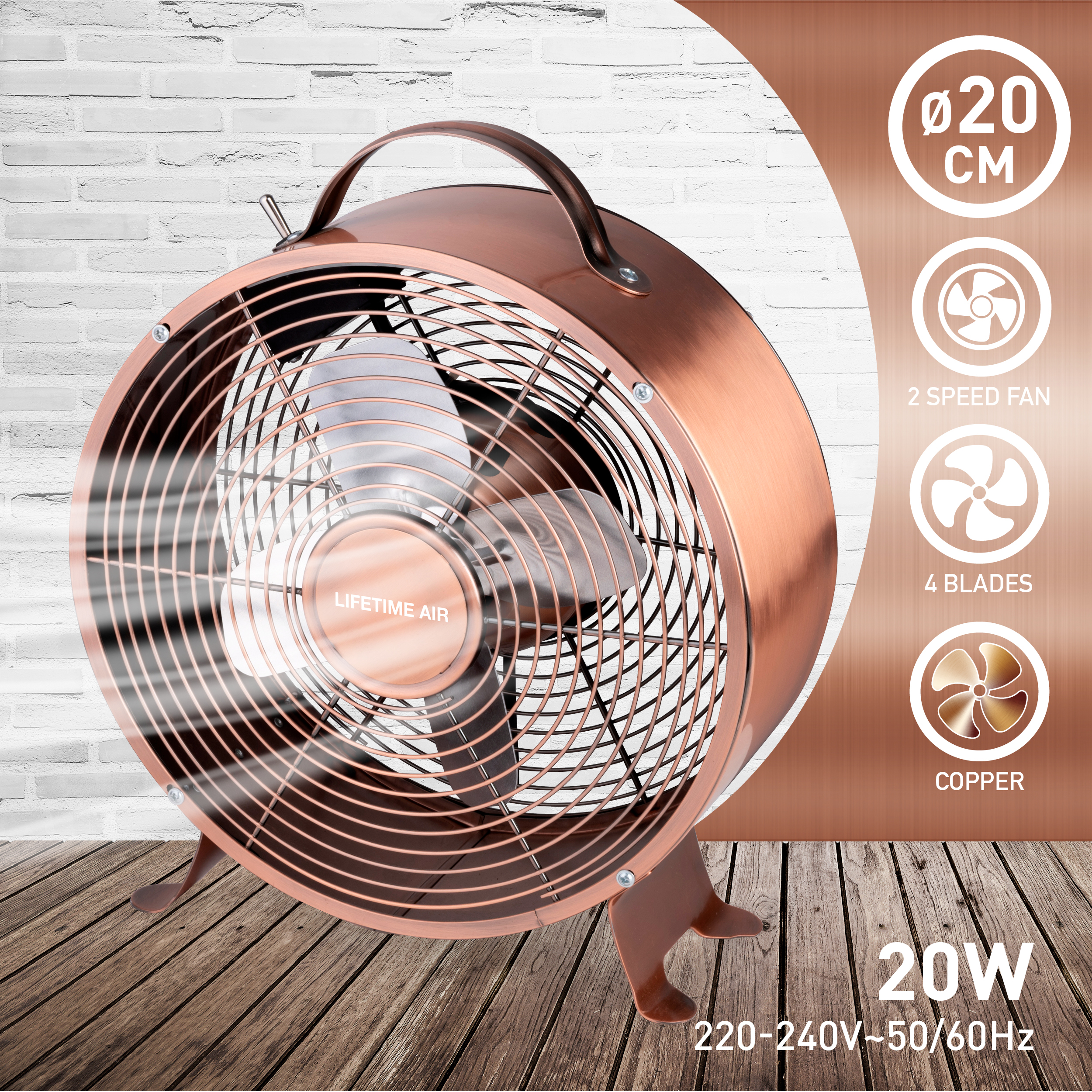 Ein kupferfarbener Ventilator mit vier Flügeln und einem Griff auf Holzoberfläche.