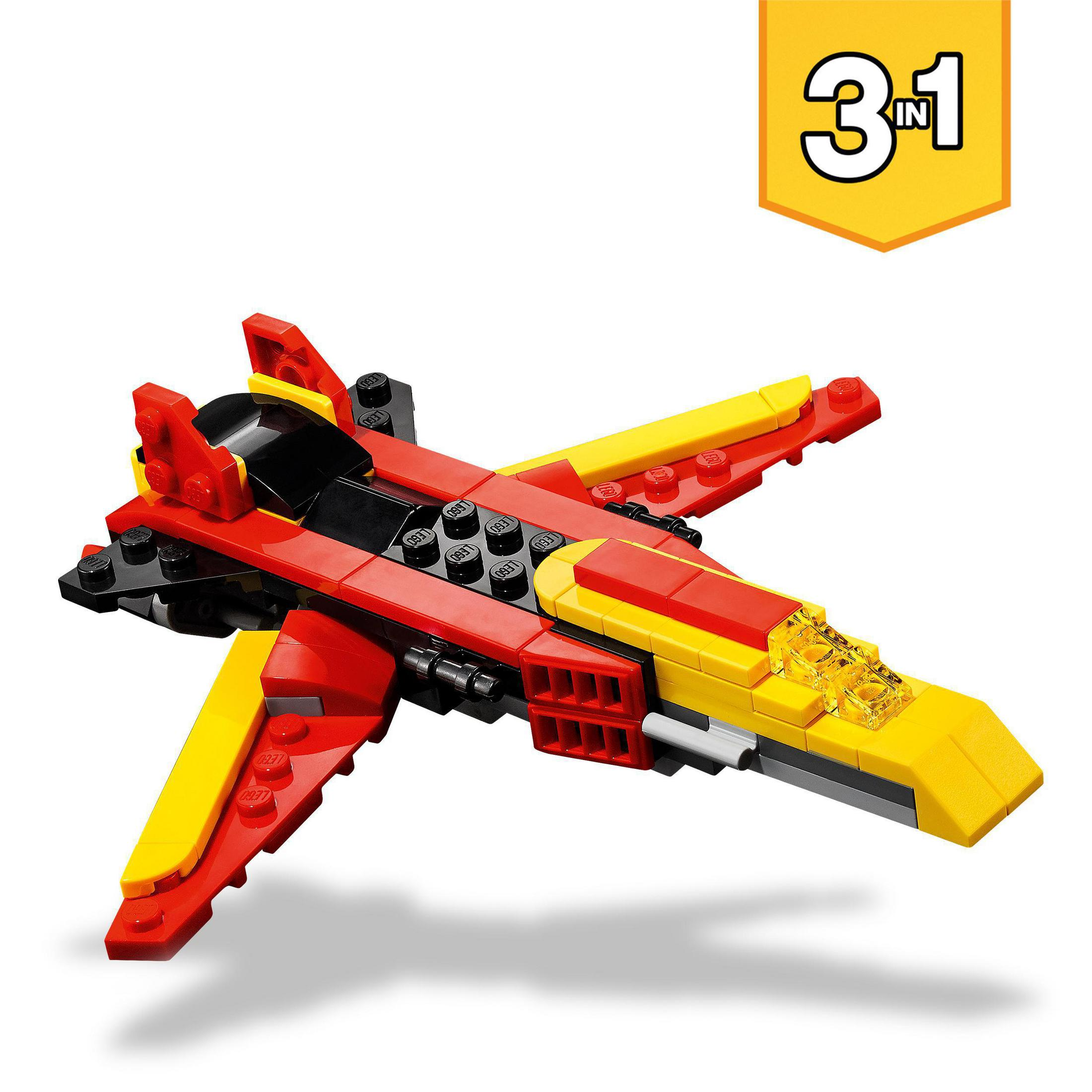 Avión de juguete rojo, amarillo y negro con etiqueta 3 en 1. Fondo blanco.