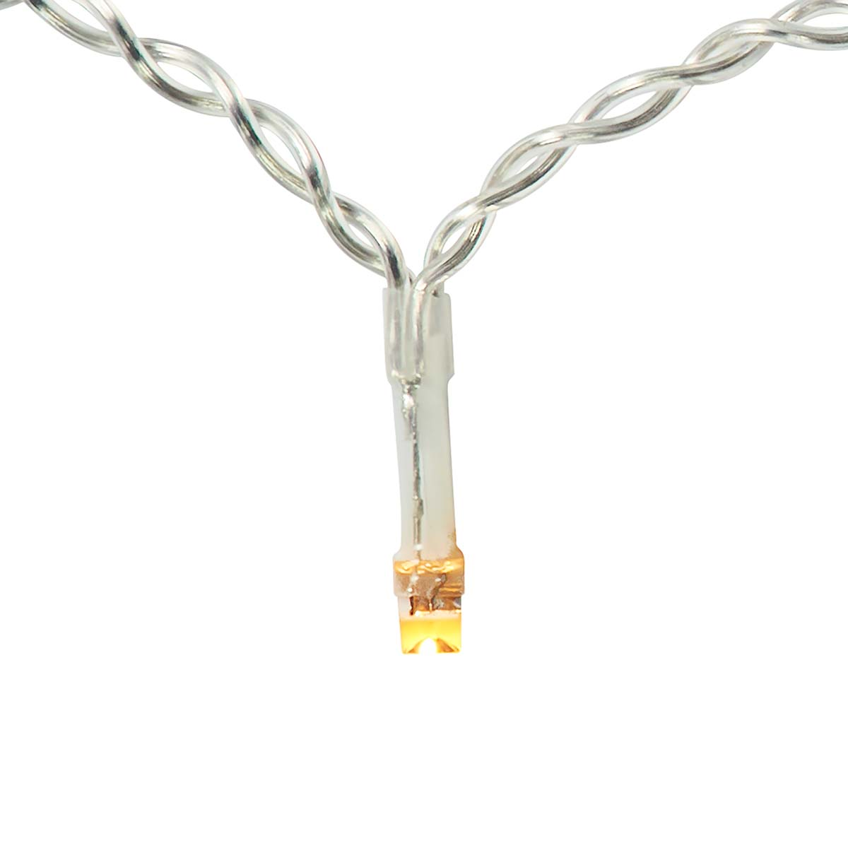 Zbliżenie pojedynczego przezroczystego przewodu z małym światłem na końcu.