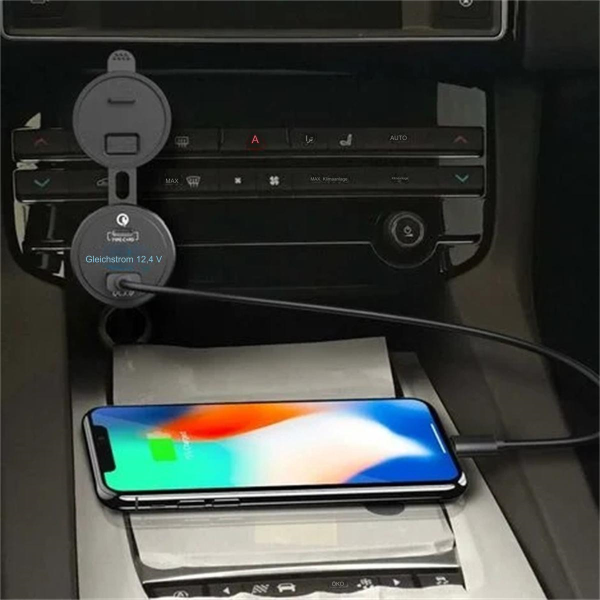Ein Telefon, das in einem Auto aufgeladen wird. Der Bildschirm ist eingeschaltet. Ein Ladegerät ist eingesteckt.