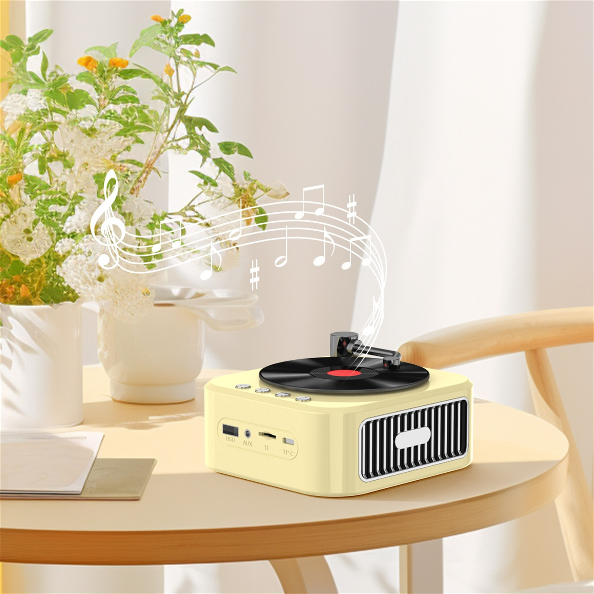 Gelber Lautsprecher im Retro-Stil mit Plattenspieler-Design, mit Noten.
