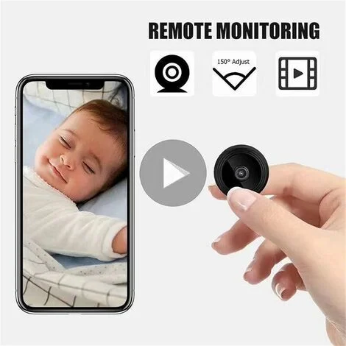 Telefon zeigt das Gesicht eines Babys; daneben eine kleine Kamera in der Hand.