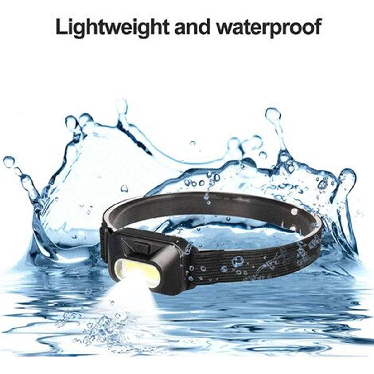 Eine schwarze Stirnlampe, die Licht aussendet, vor Wasserspritzern.