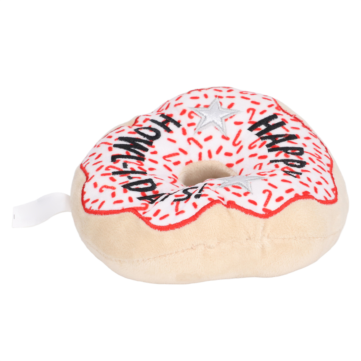 Donut-Plüschtier mit roten Streuseln, weißem Zuckerguss und dem Schriftzug 'DARE TO BE HAPPY'.