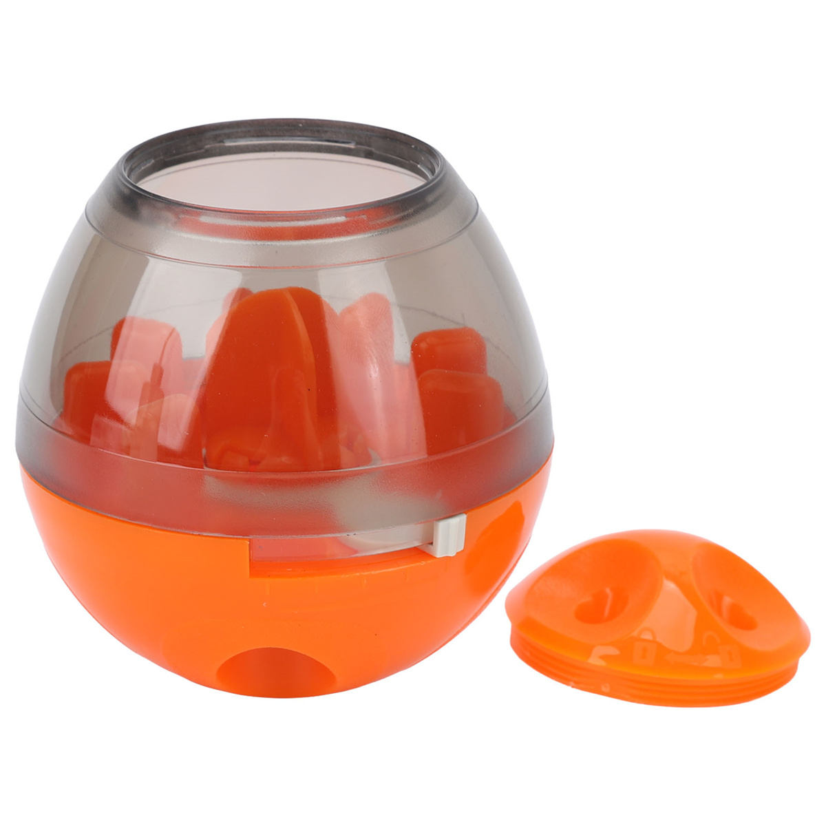 Orangenes Haustierspielzeug mit transparentem Deckel, Deckel offen, orange Objekte.