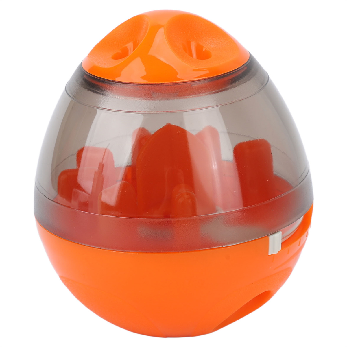 Ein orangefarbenes und schwarzes Haustierspielzeug in Eiform.