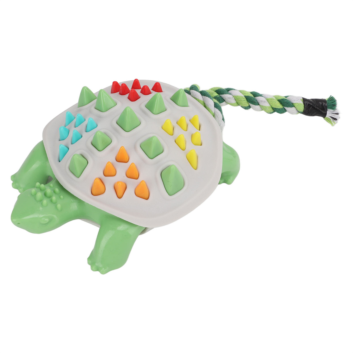 Ein grünes Schildkrötenspielzeug mit weißem Panzer und farbigen Stacheln, mit einem Seil, auf Weiß.
