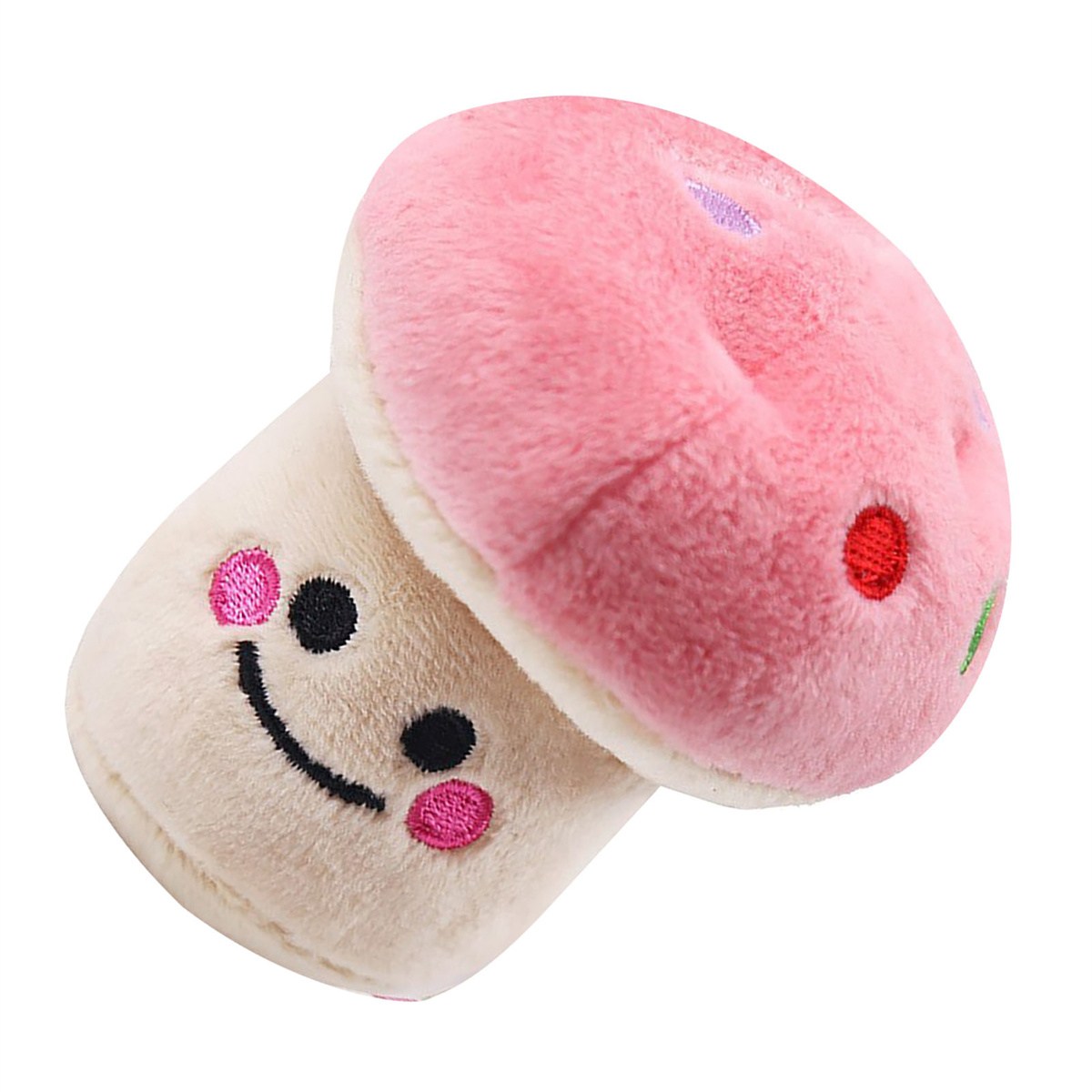 Ein Plüschpilzspielzeug mit rosa Oberteil und cremefarbenem Sockel. Ein lächelndes Gesicht ist gestickt.