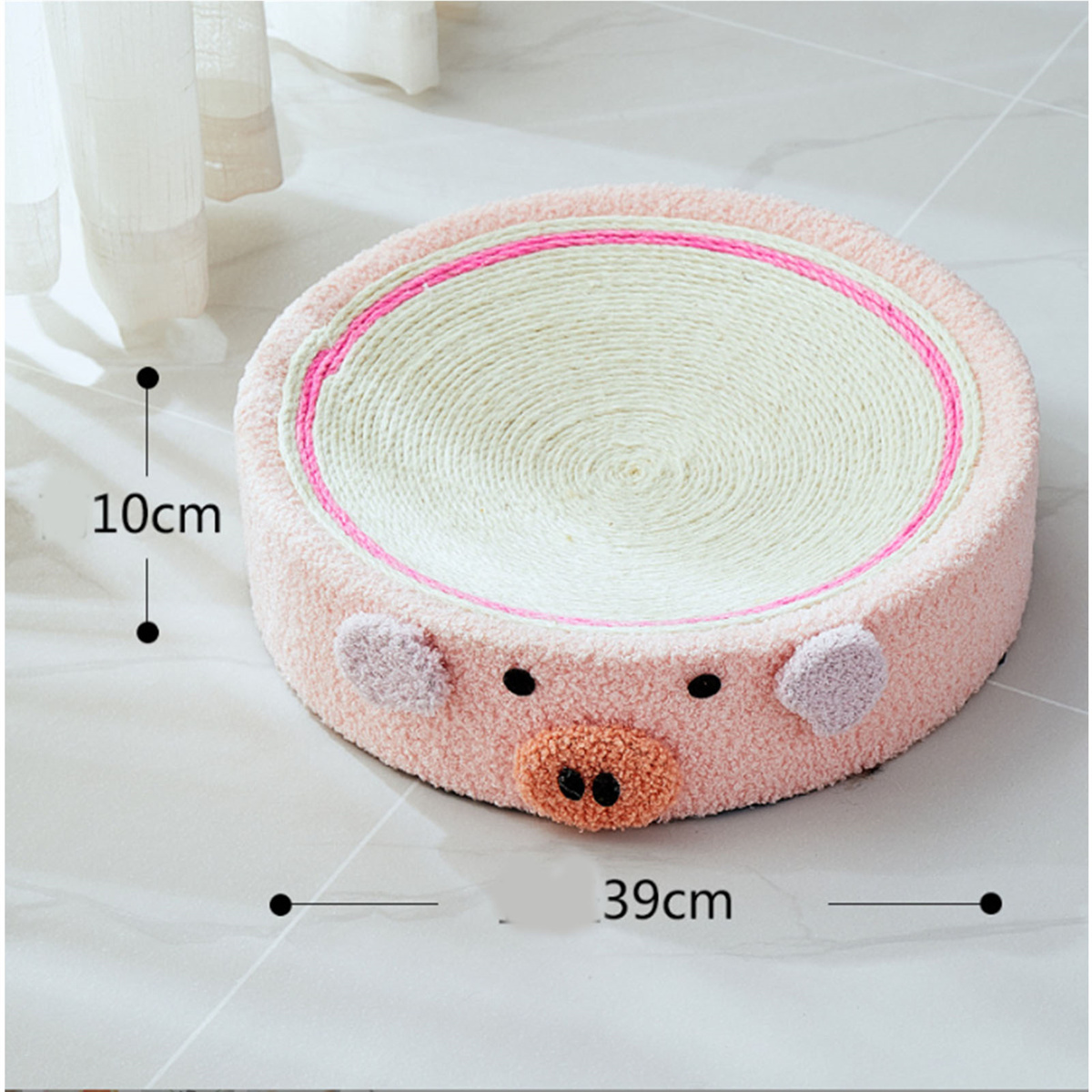 Ein rosa, schweineförmiges Haustierbett mit den Maßen 10 cm und 39 cm.