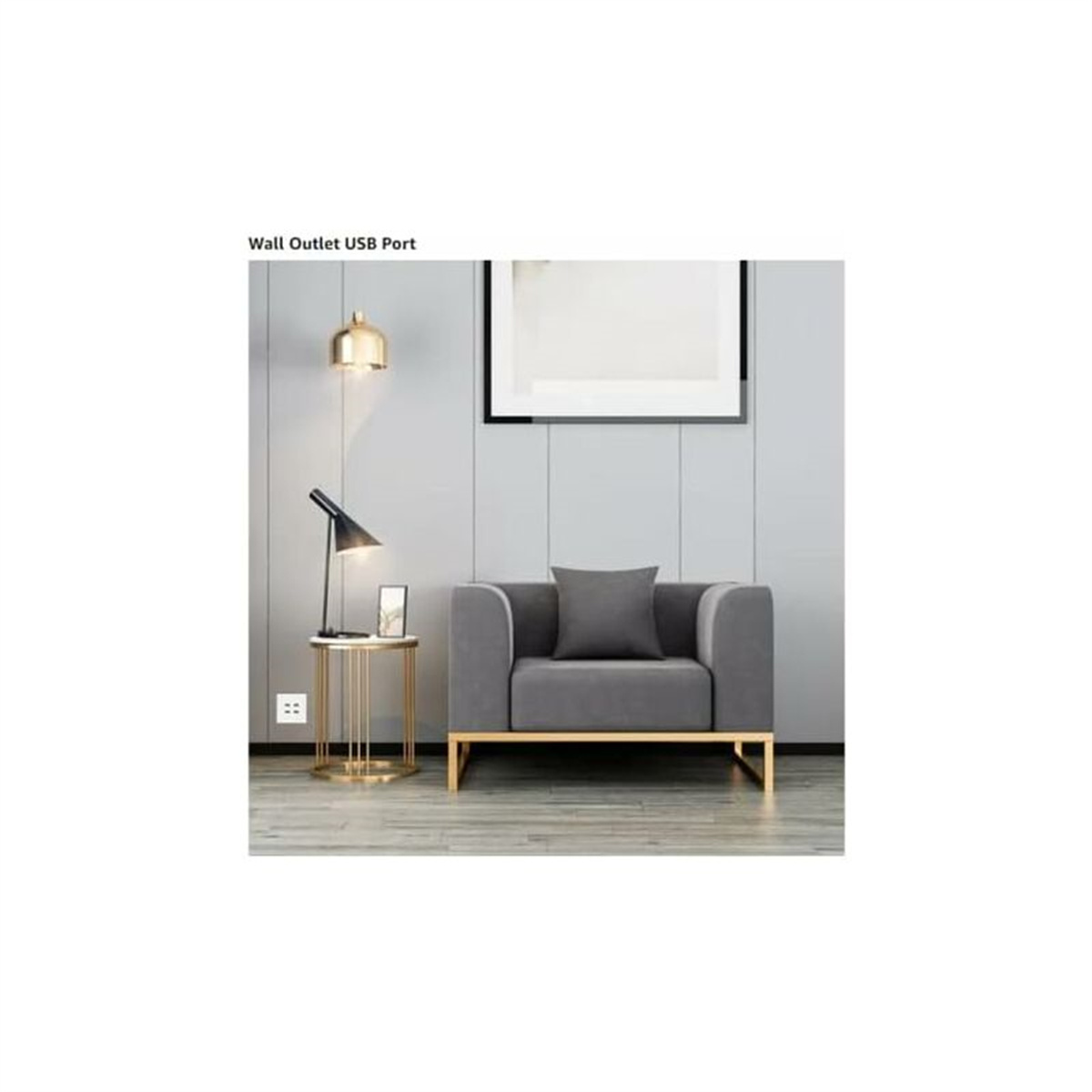 Ein grauer Sessel mit Kissen, ein Beistelltisch mit Lampe und eine USB-Steckdose an einer grauen Wand.