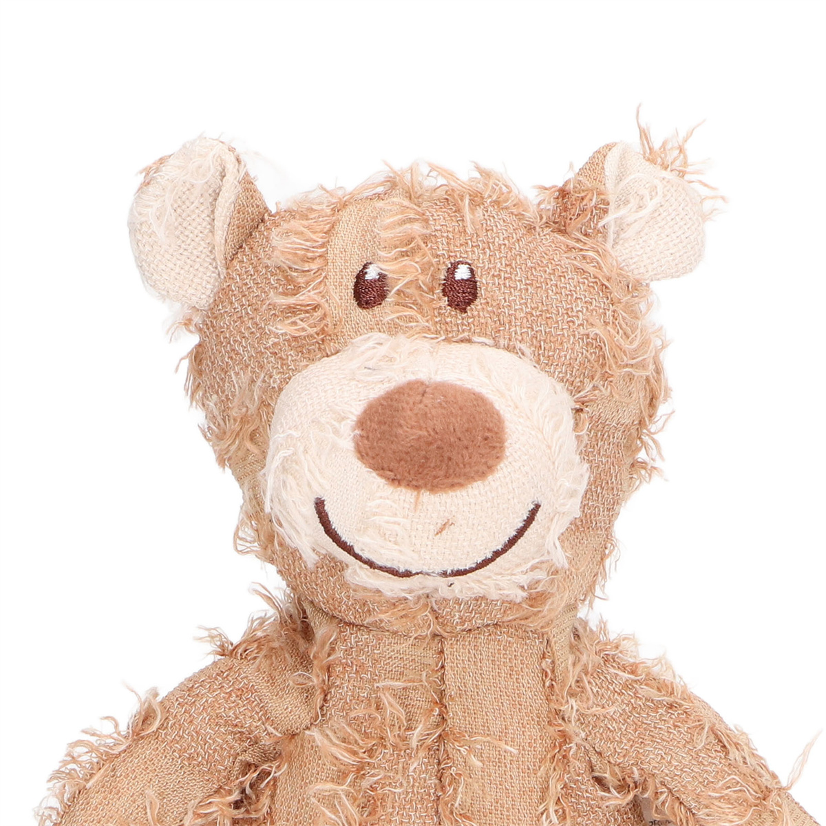 Nahaufnahme des Gesichts eines Teddybären. Beiges Fell, braune Nase und Augen, lächelnder Mund.