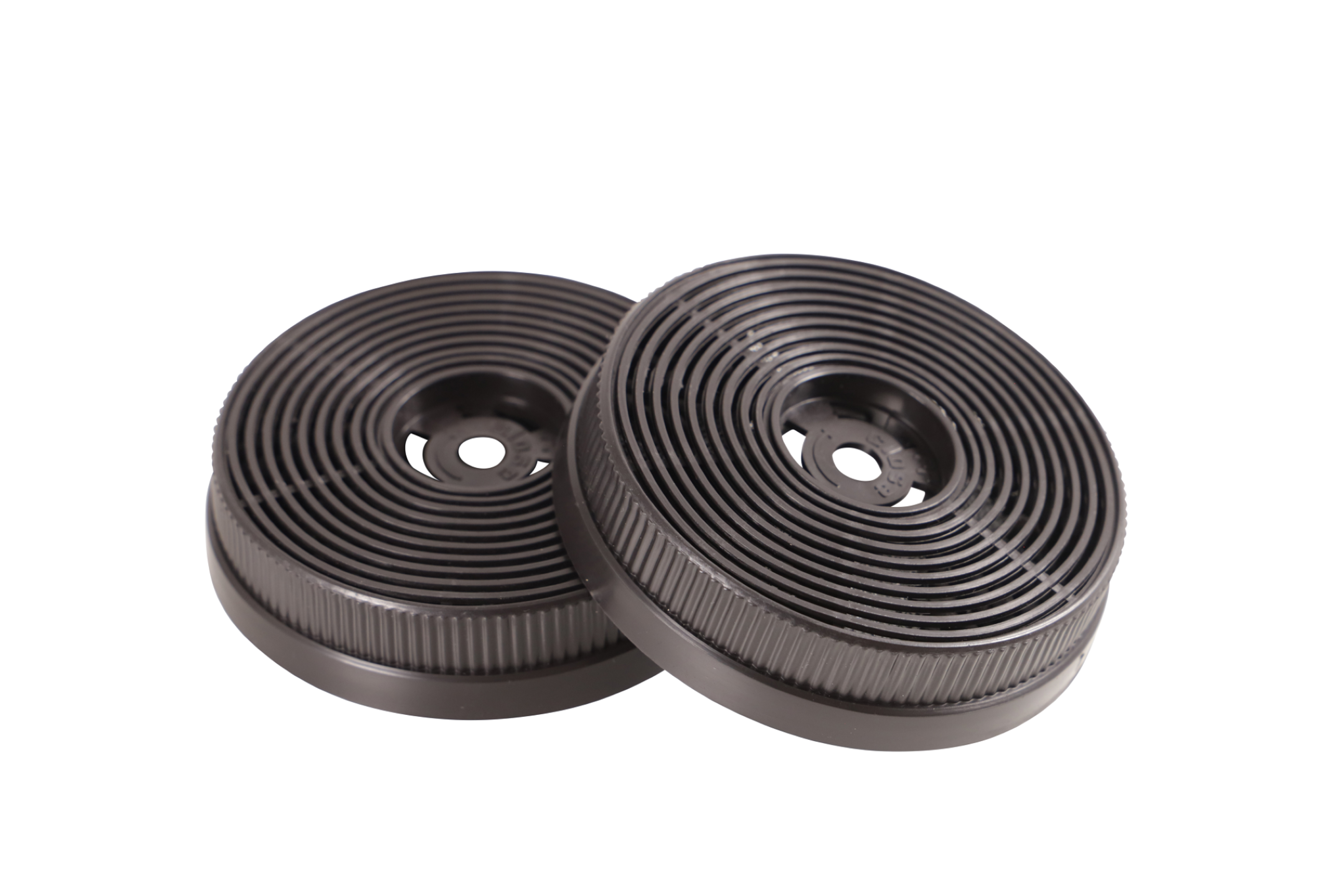 Two round black charcoal filters, concentric circles. White background. For a kitchen hood.