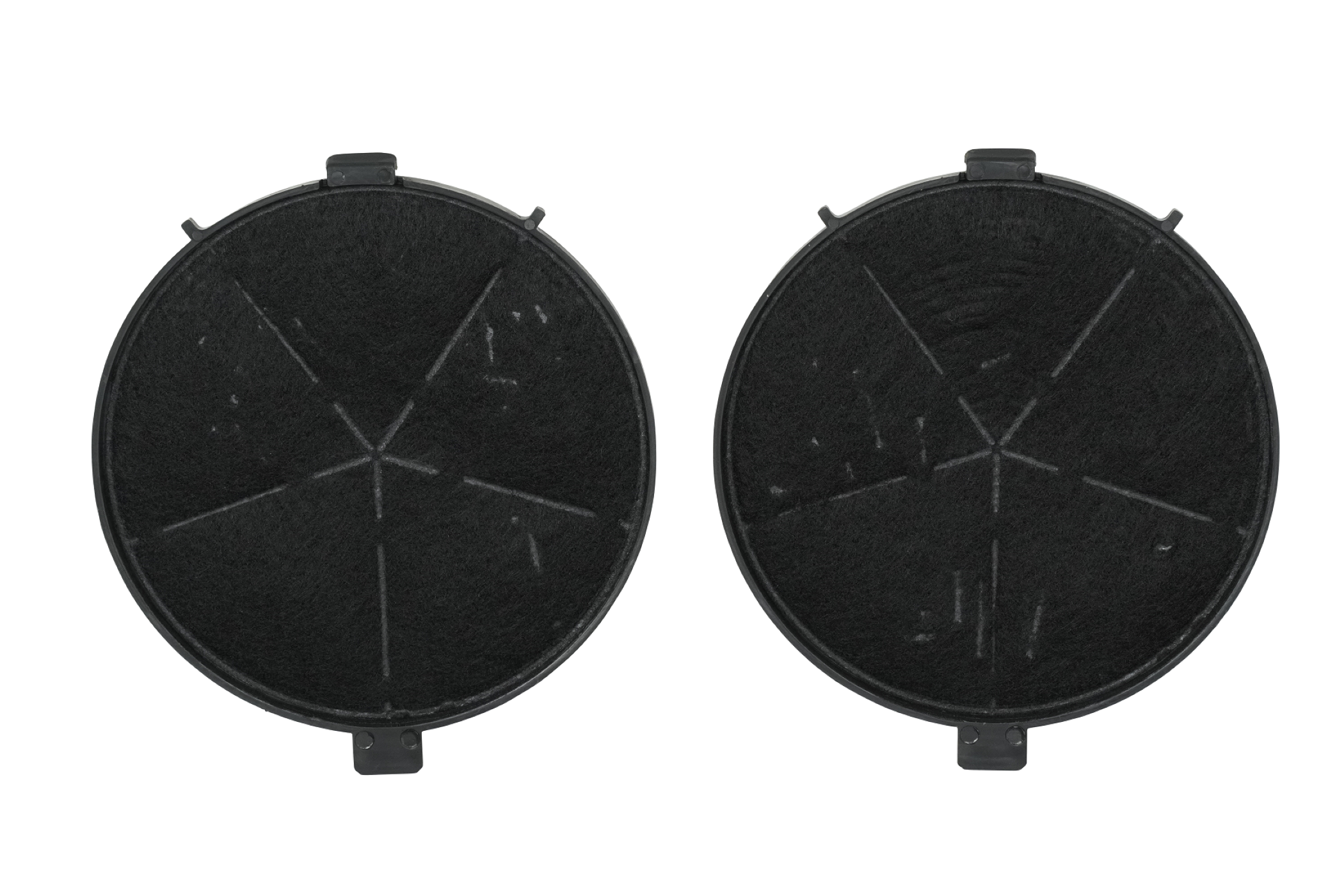 Two circular black filters with a star-like pattern in the center, set against a white backdrop.