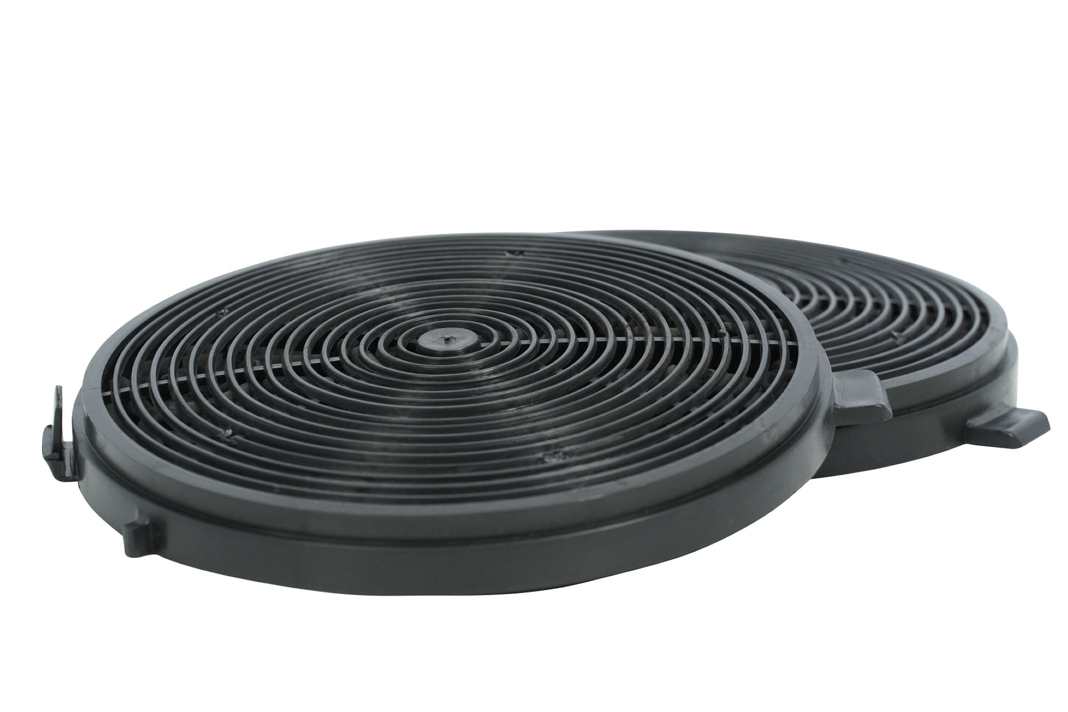 Two black charcoal filters, circular with concentric rings, on a white background.